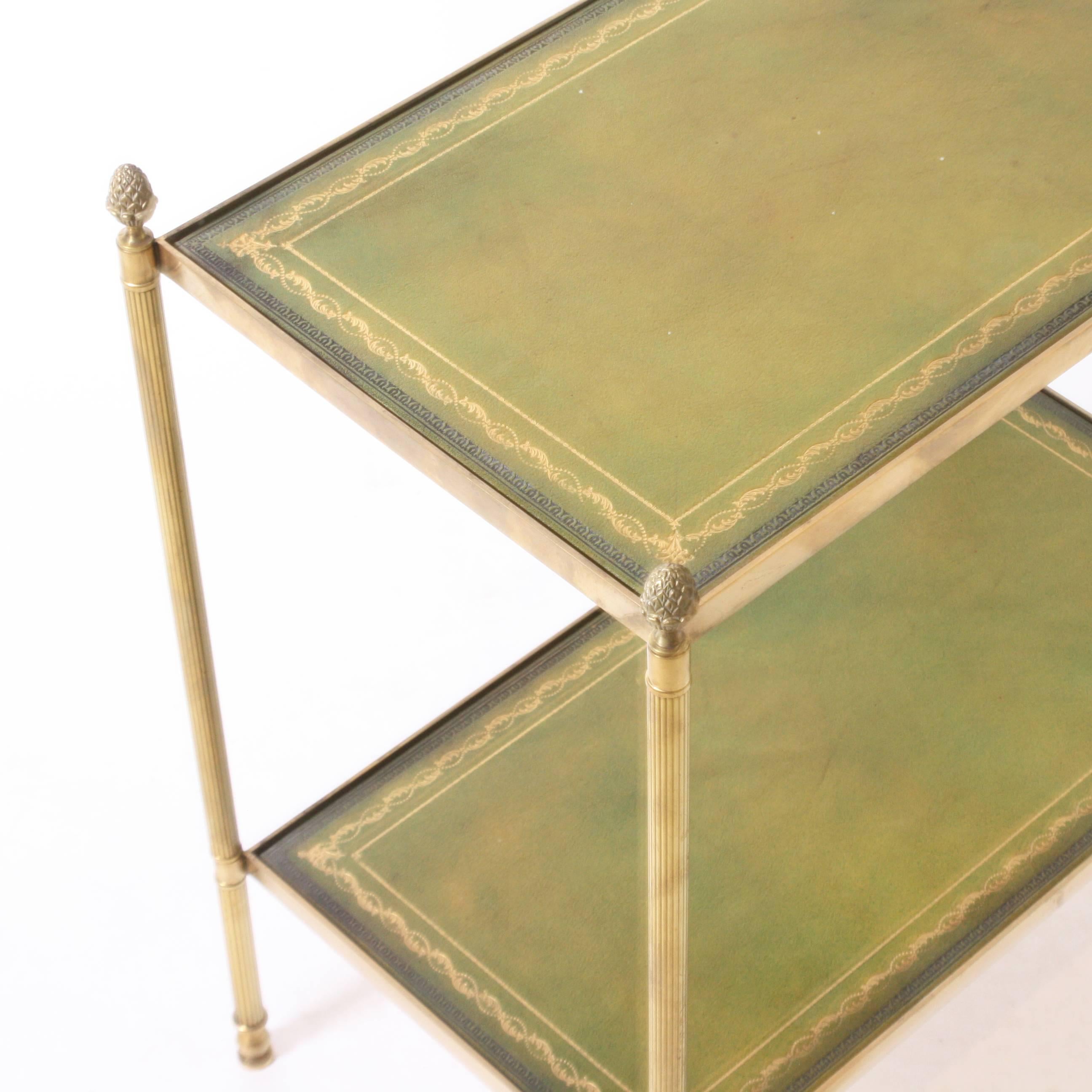 Pair of bronze side tables with original green leather tops in the style of Jansen, circa 1940.