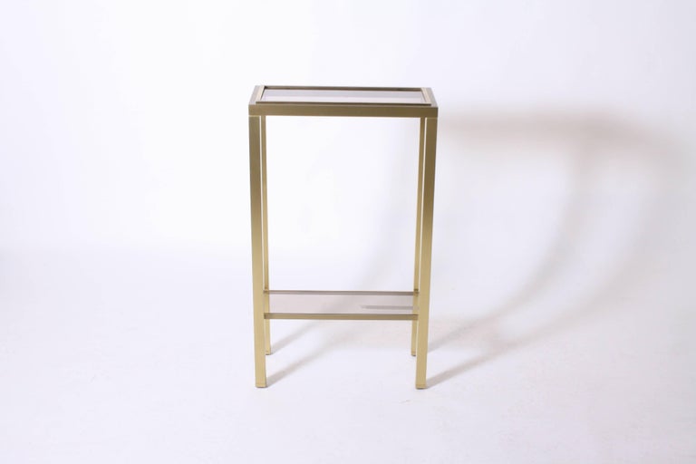 Pair of brass pedestal tables by Guy Lefevre for Maison Jansen, circa