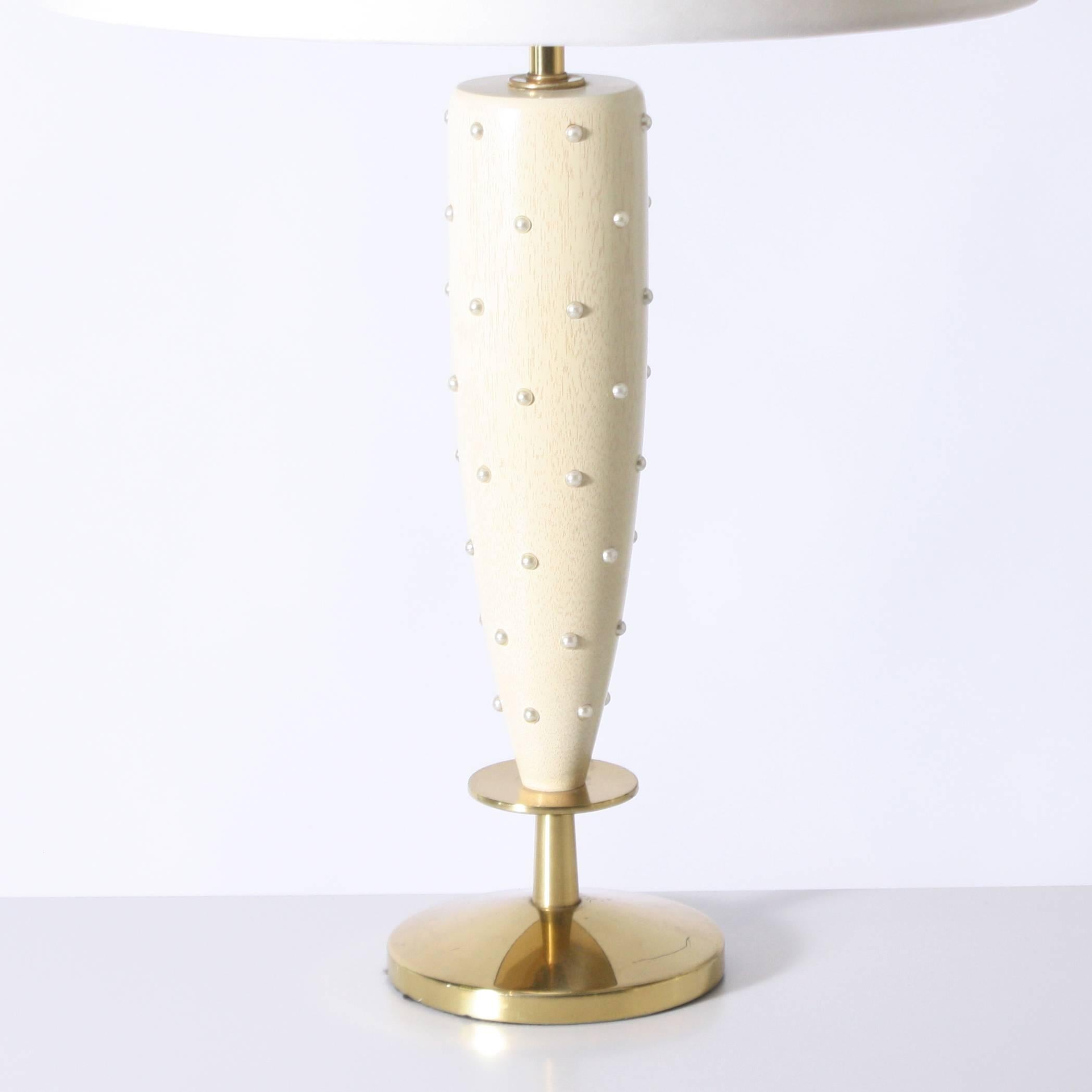 Pair of lamps in the style of Tommi Parzinger

Shade is 17 1/2" diameter X 29"h overall
