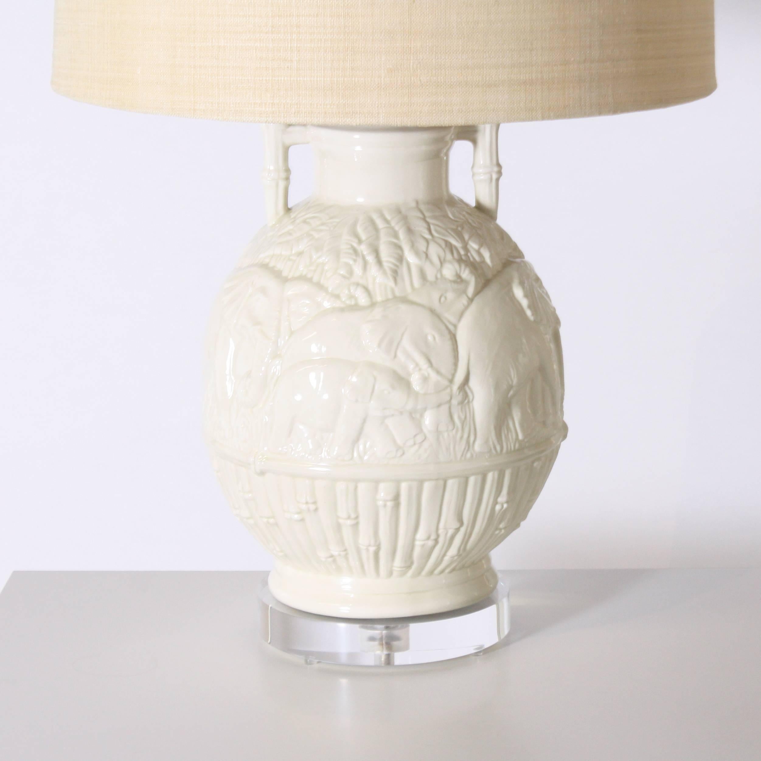 1960s white ceramic ginger jar lamp with elephant and faux bamboo detail. 21