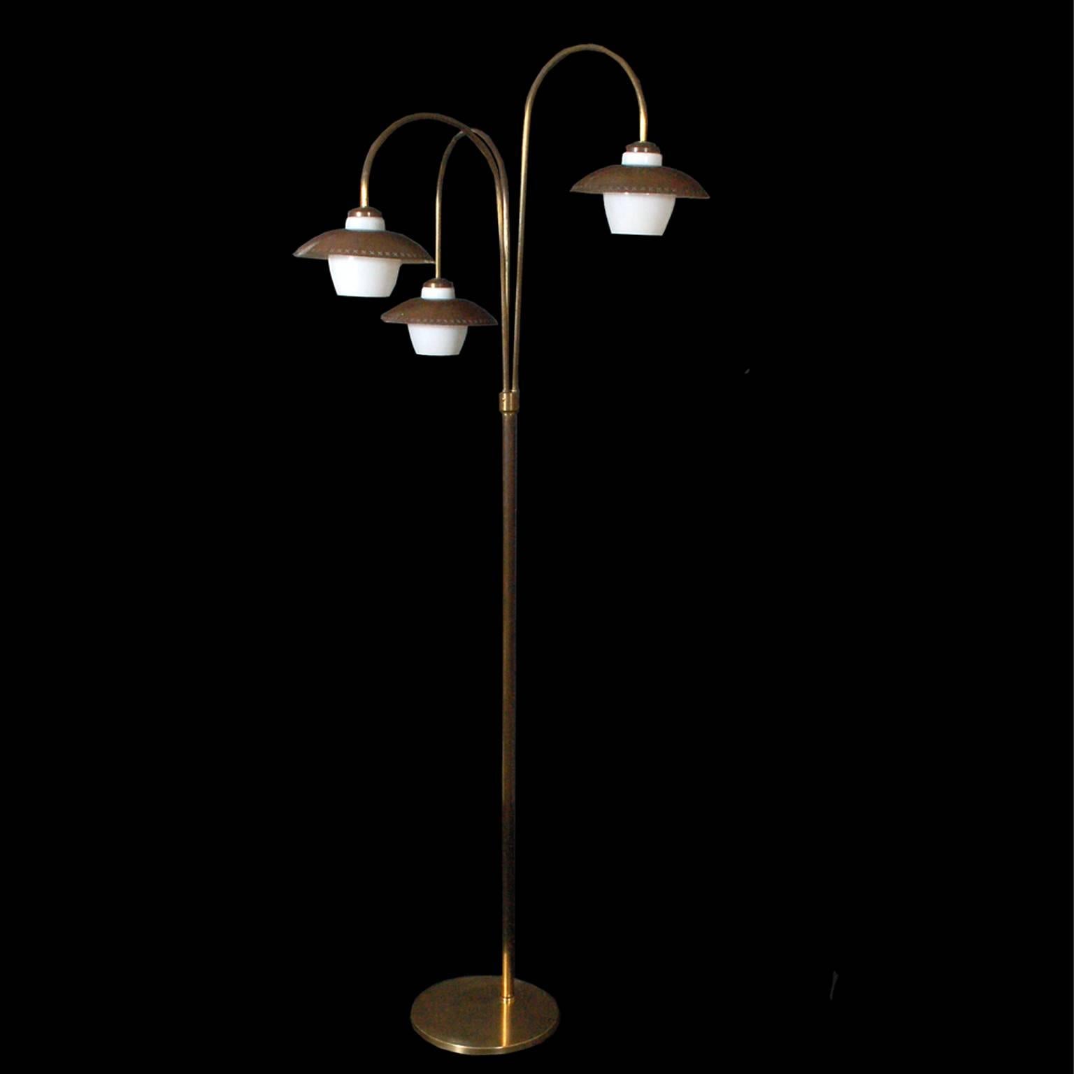 Patinated brass, glass shades, three-arm floor lamp in the shape of flowers.
                     
