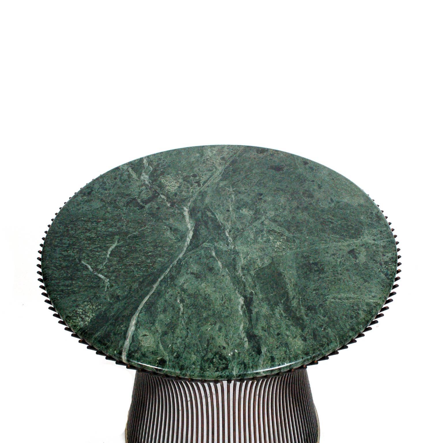 Original bronze wire base with green marble top.