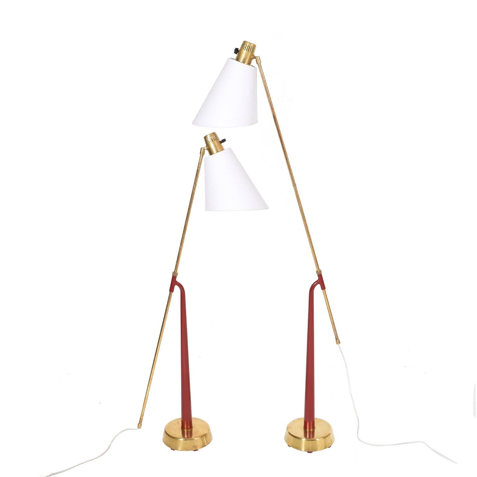 Pair of adjustable lamps, brass and red painted metal stem. Height and shades adjustable. Brass base. Stamped on base 