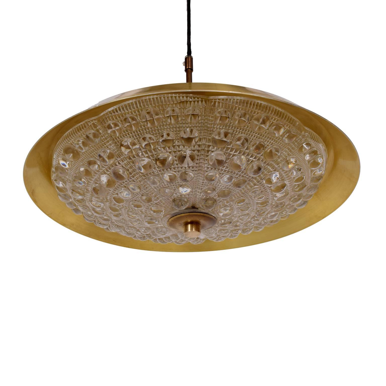 Pendant lamp with metal shade over textured glass inner shade; six sockets for small light bulbs. Retains Lyfa paper label. Total height: 37