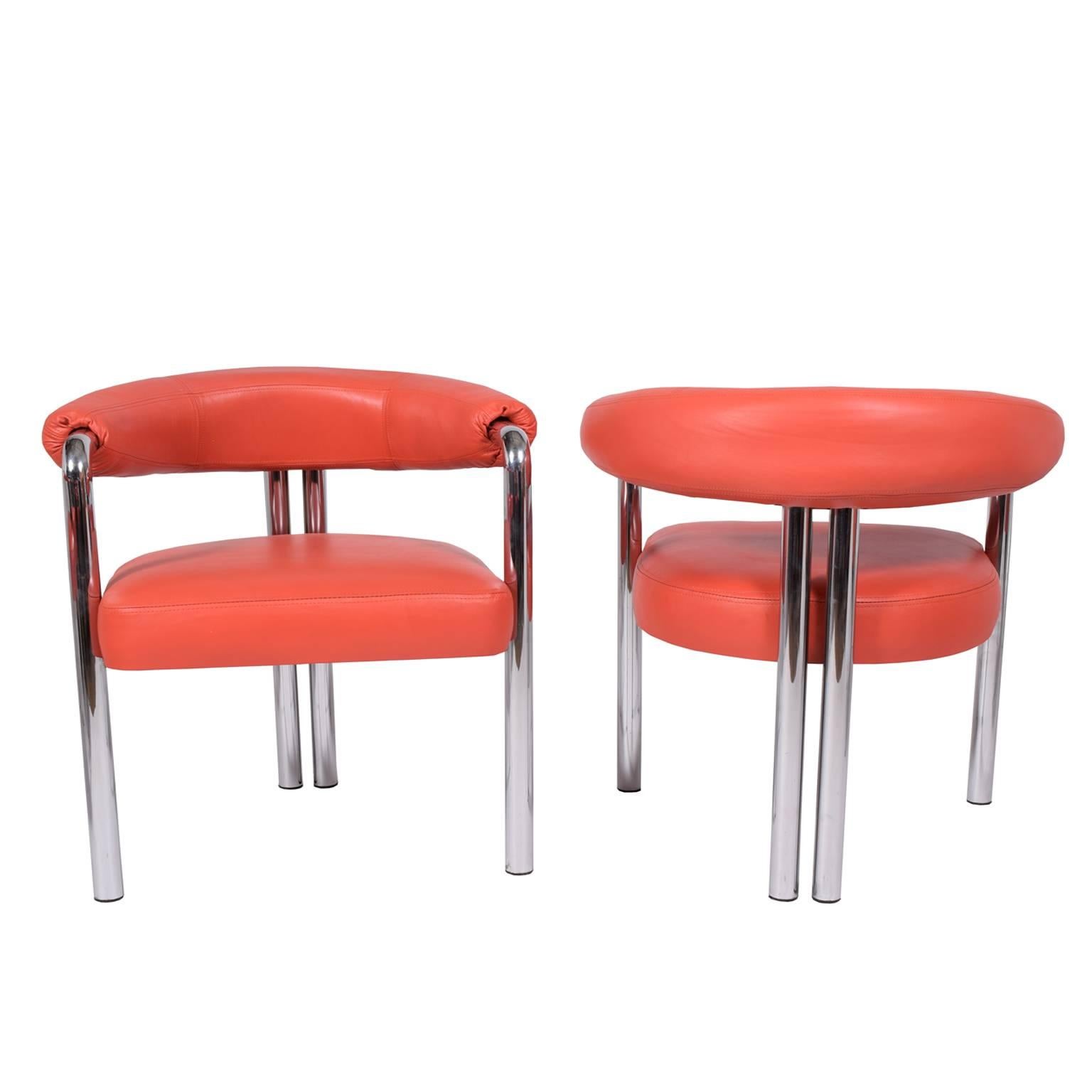 Curved and upholstered back and seat on polished chrome tubular frame. 
New leather upholstery. Retains label.
