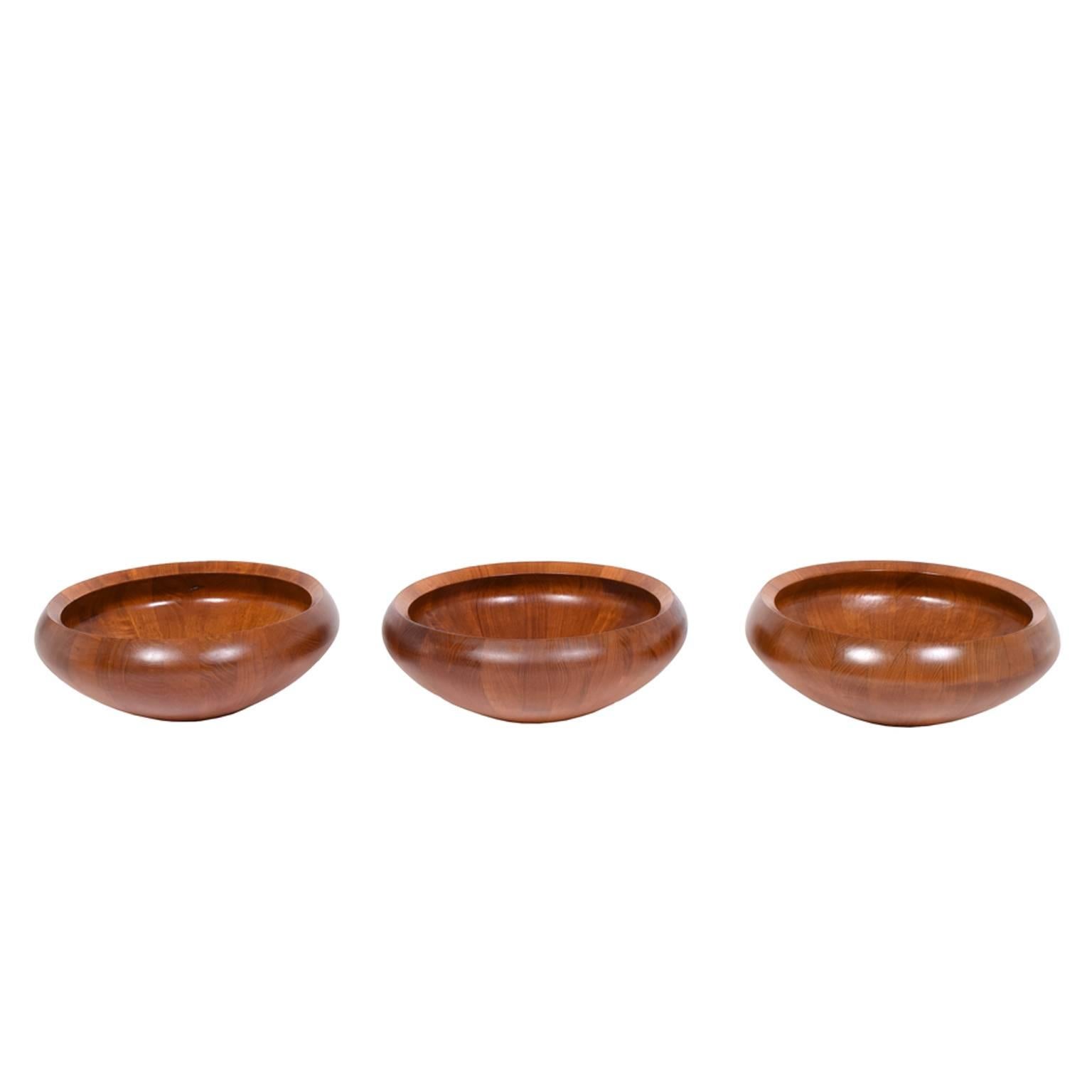 Three solid teak bowls made in butcher block technique, designed by Jens H. Quistgaard for "Dansk". Marked on bottom.