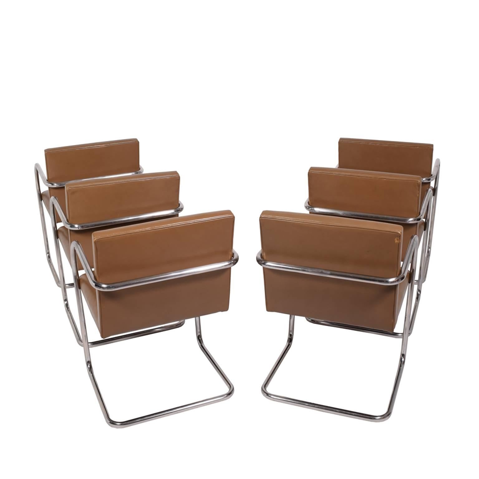 Six stainless steel Classic tubular Brno chairs, previously reupholstered in leather.
Made by Knoll.
Arm height 25.75".