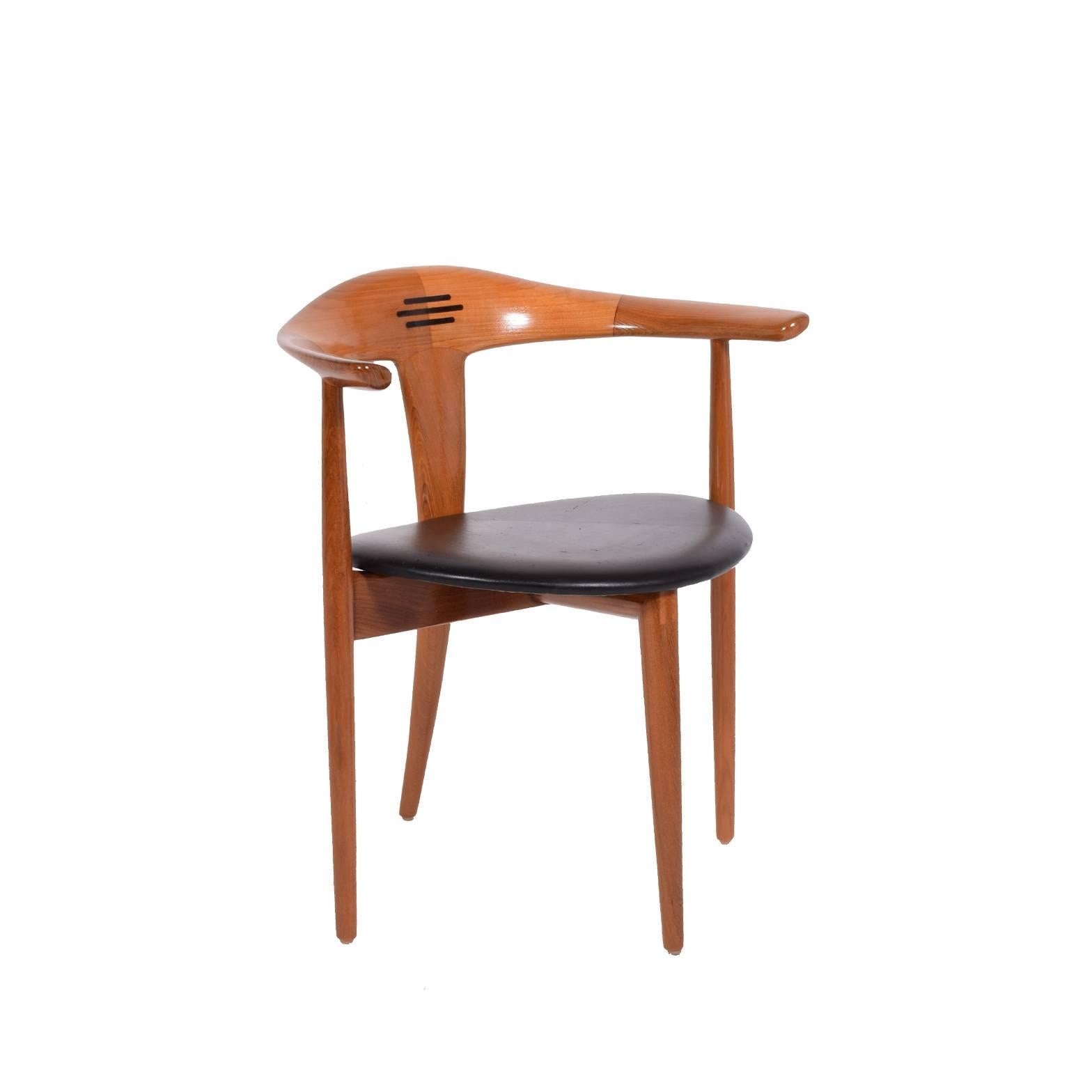 Solid teak armchair designed in 1962. Inlaid design at back of chair connection. Marked Randers Møbelfabrik and Danish quality control. Has U.S. Patent from May 21, 1963 from Andersen and Pedersen assigning half the design to Moreddi Inc of Long
