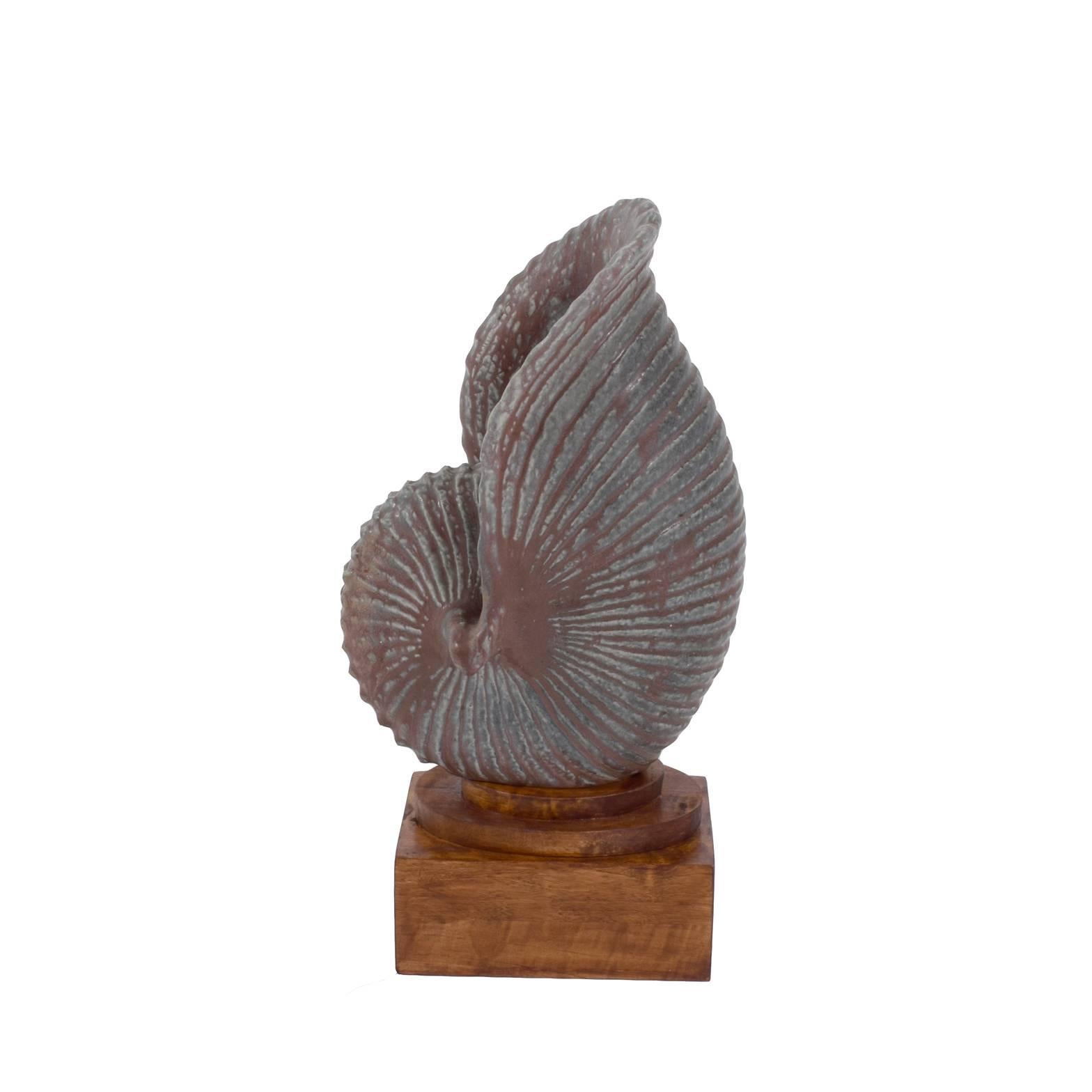 Large seashell sculpture design by Gunnar Nylund made by Rörstrand in Sweden, circa 1960 signed on the bottom size with the pedestal.