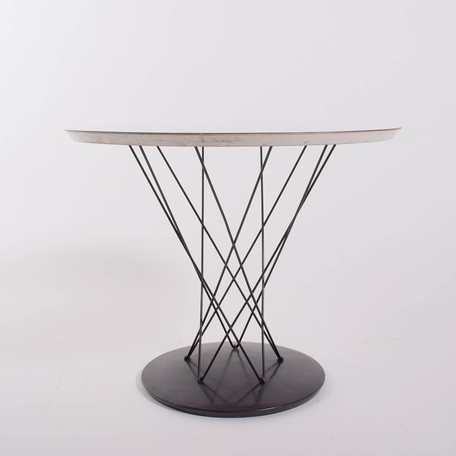 All original condition Cyclone table. Steel wire and base with black finish; white laminate top.