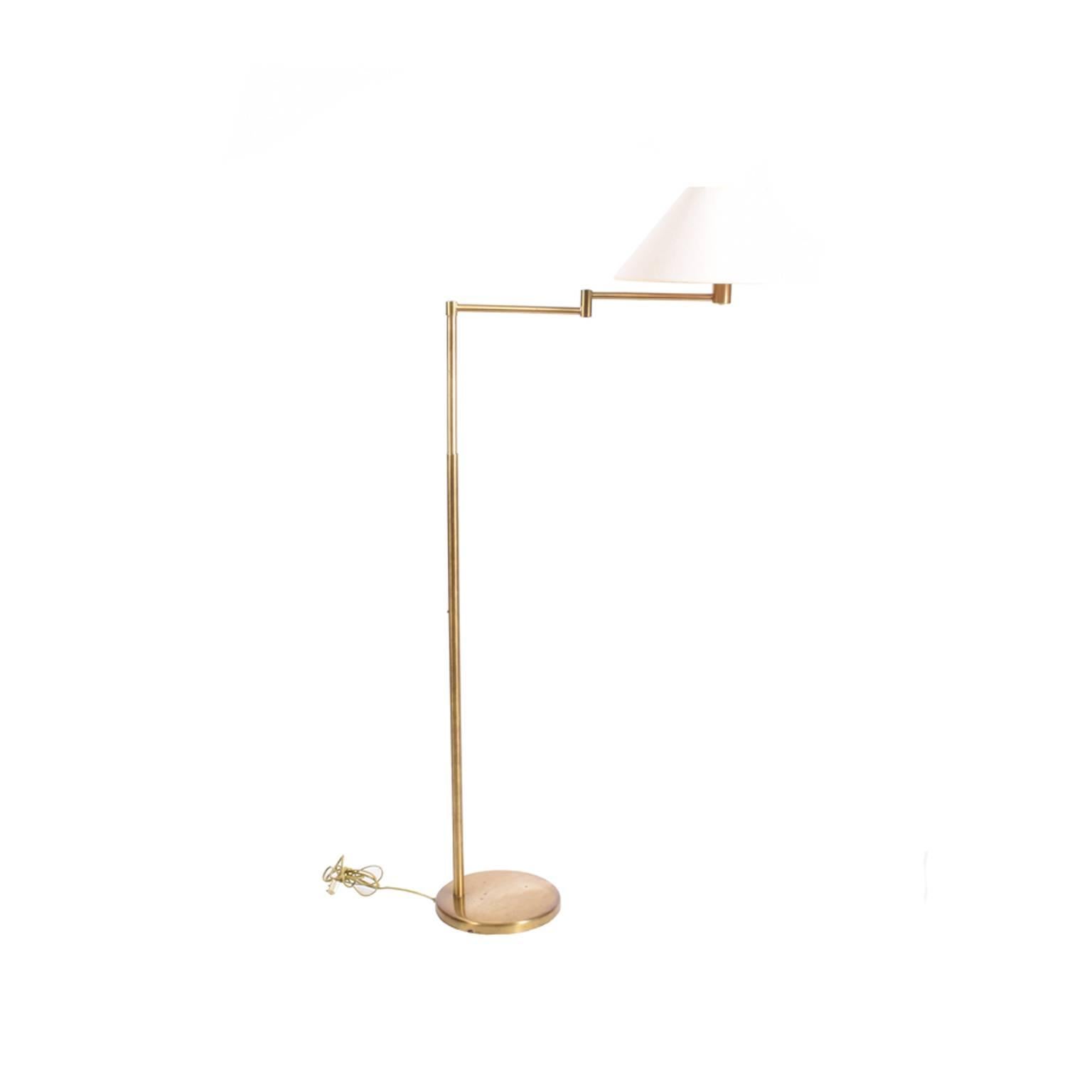 Original floor lamp adjustable height with original shade and glass defuser mark on the arm and bottom. Measures: Height 49