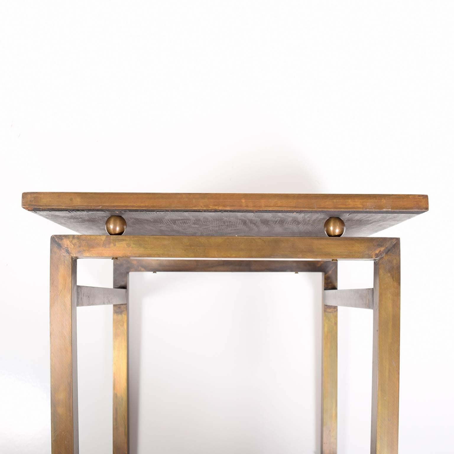 Original etched and patinated bronze side table with pewter overlay and polychrome details. Signed on top of table.