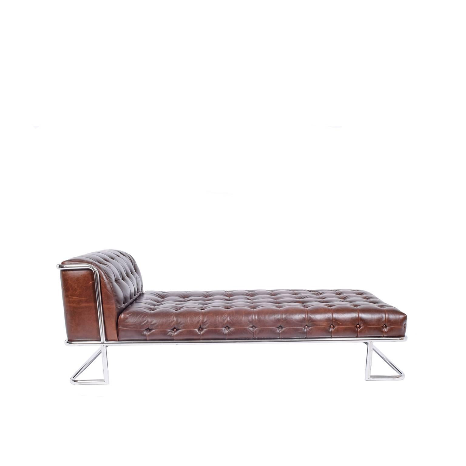 Wonderful tubular steel frame with tufted leather upholstered daybed/seating.