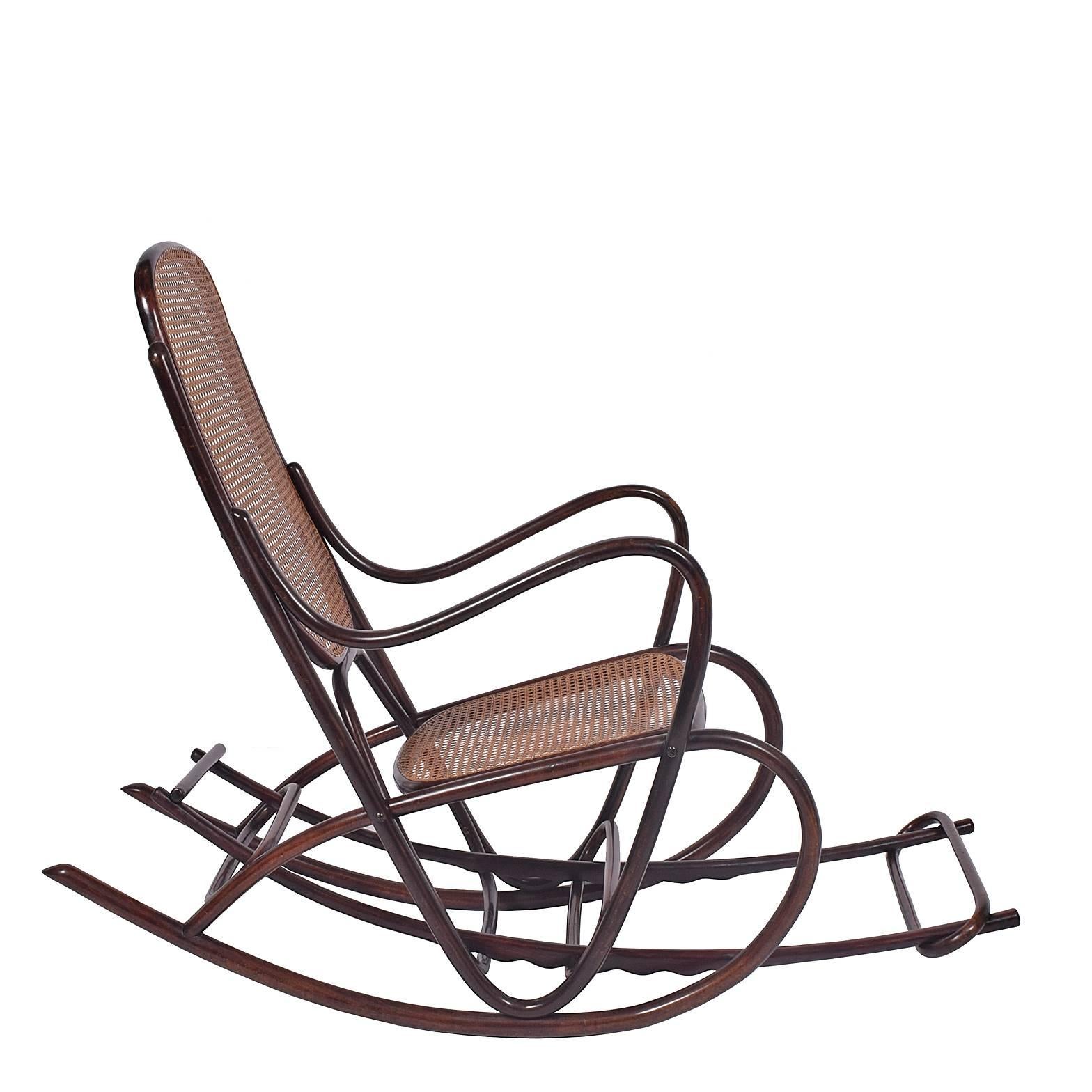 A great example of bentwood furniture. Antonio Volpe was a very early Thonet retailer in the 19th century. In the late 1800s Volpe started his own production of bentwood furniture in Udine, Italy. Comes with foot support.