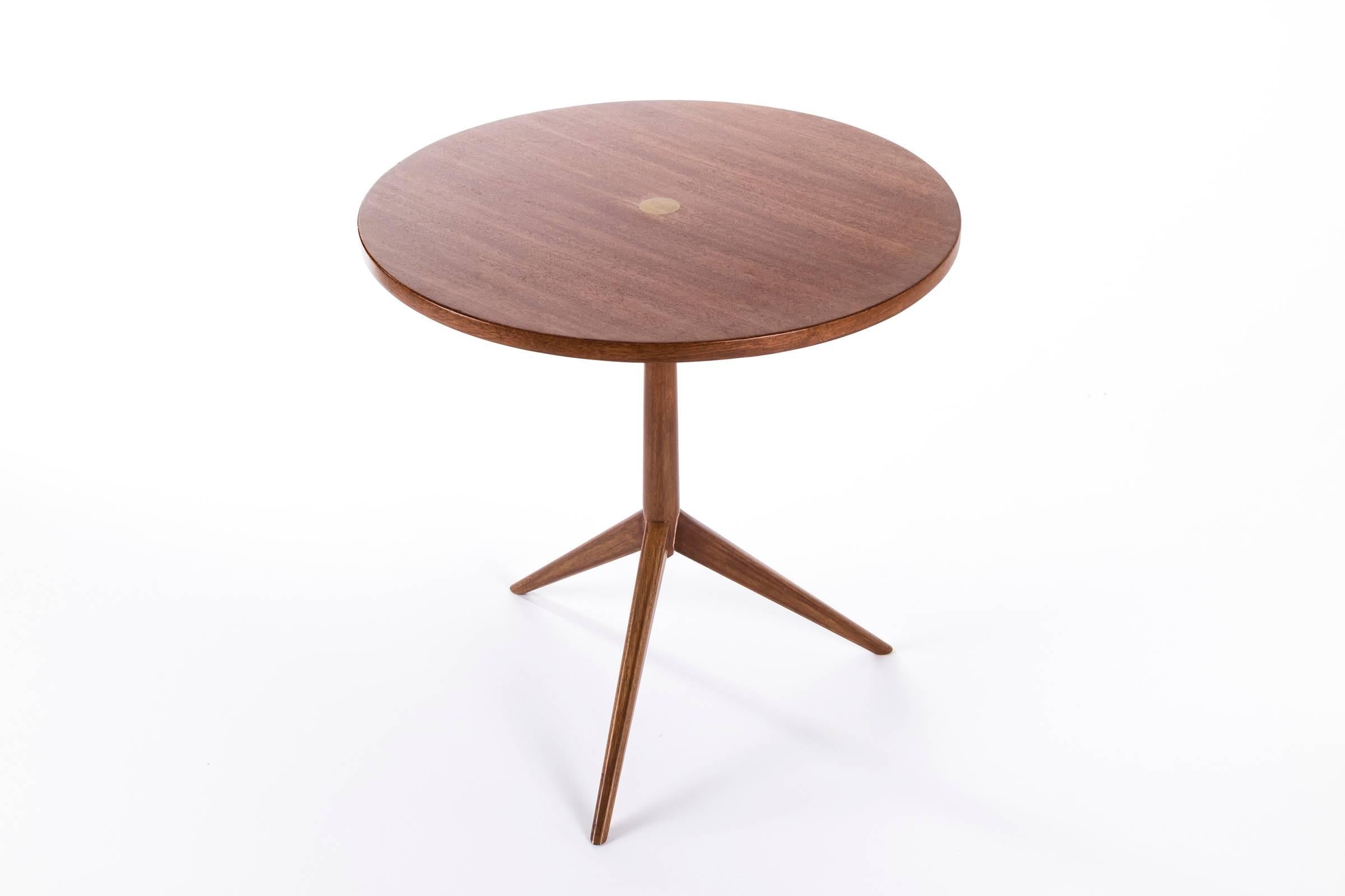 Paul McCobb occasional table, model 70008.
Bleached mahogany wood with brass insert.