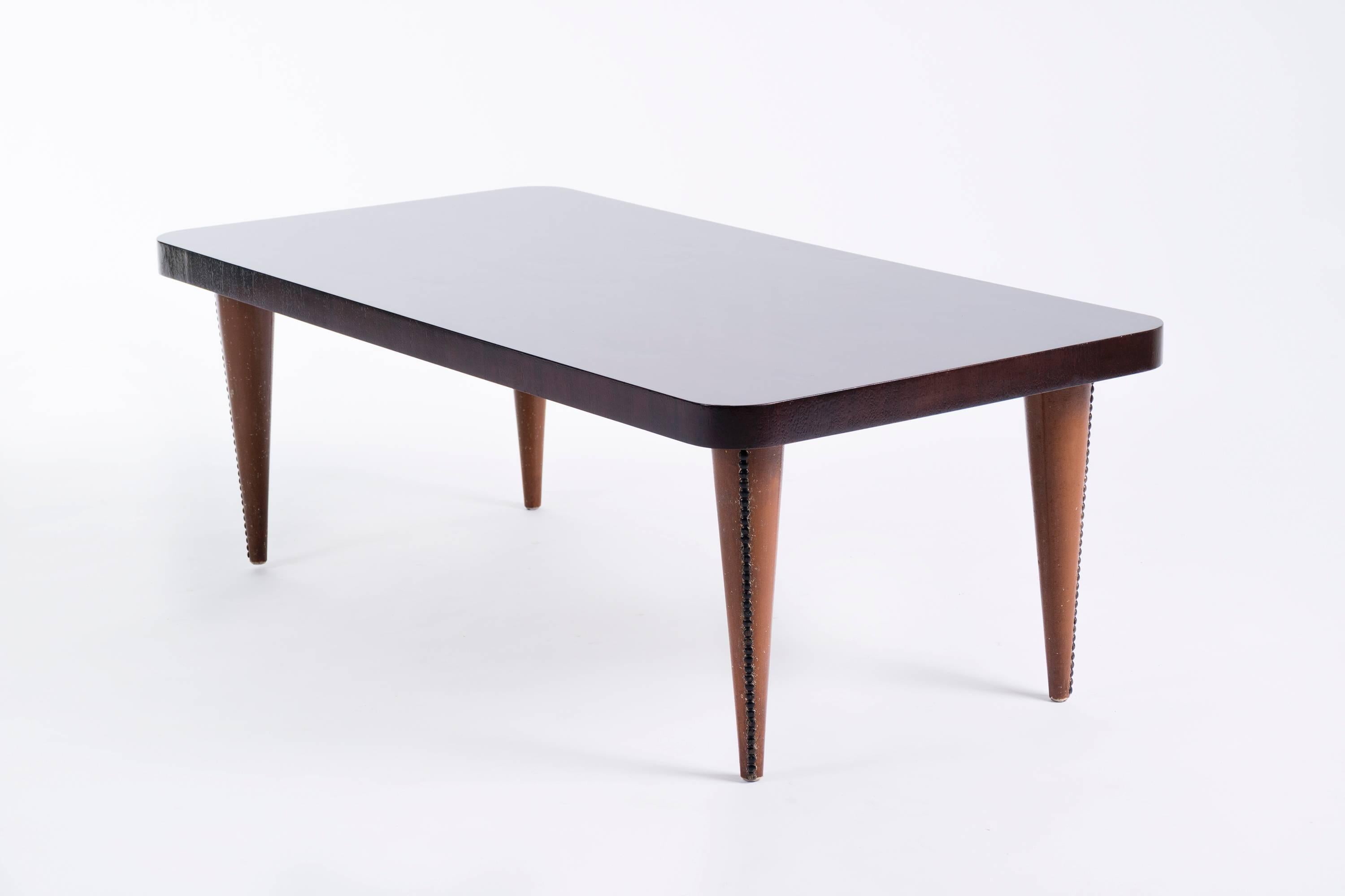 Paldao Group Tables, Model No. 4119.  Leatherette legs with nail trim.  Acacia Burl top. Partial label to underside.