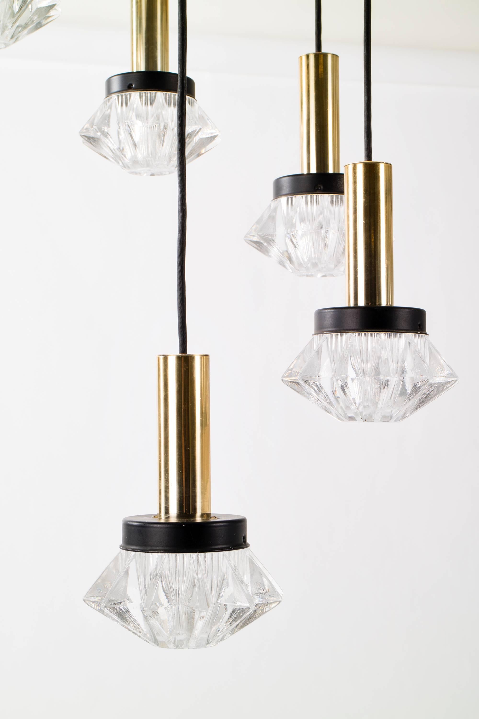 Brass and faceted glass chandelier.