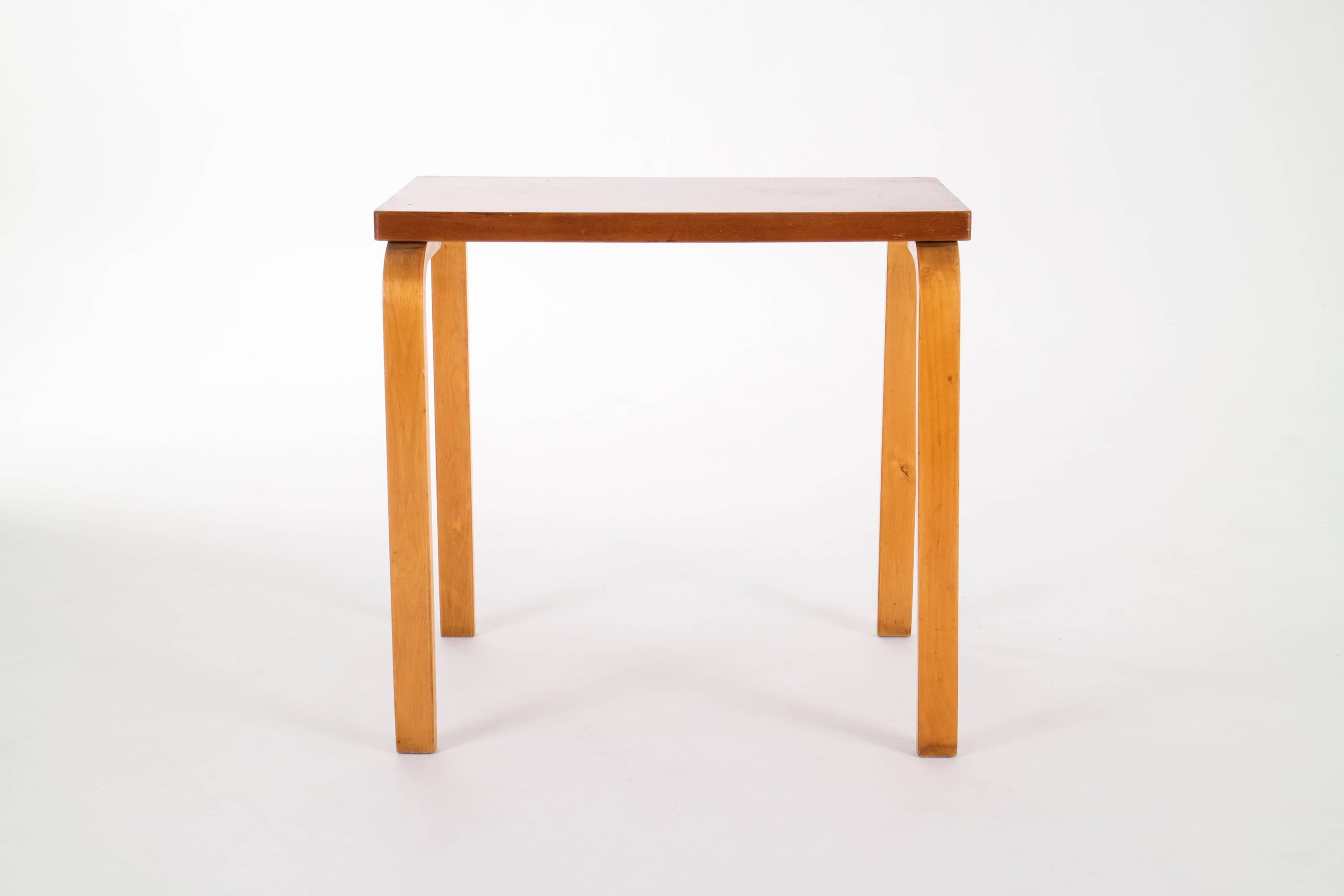 L-Leg table, designed by Alvar Aalto for Artek. [Stamped to underside].
