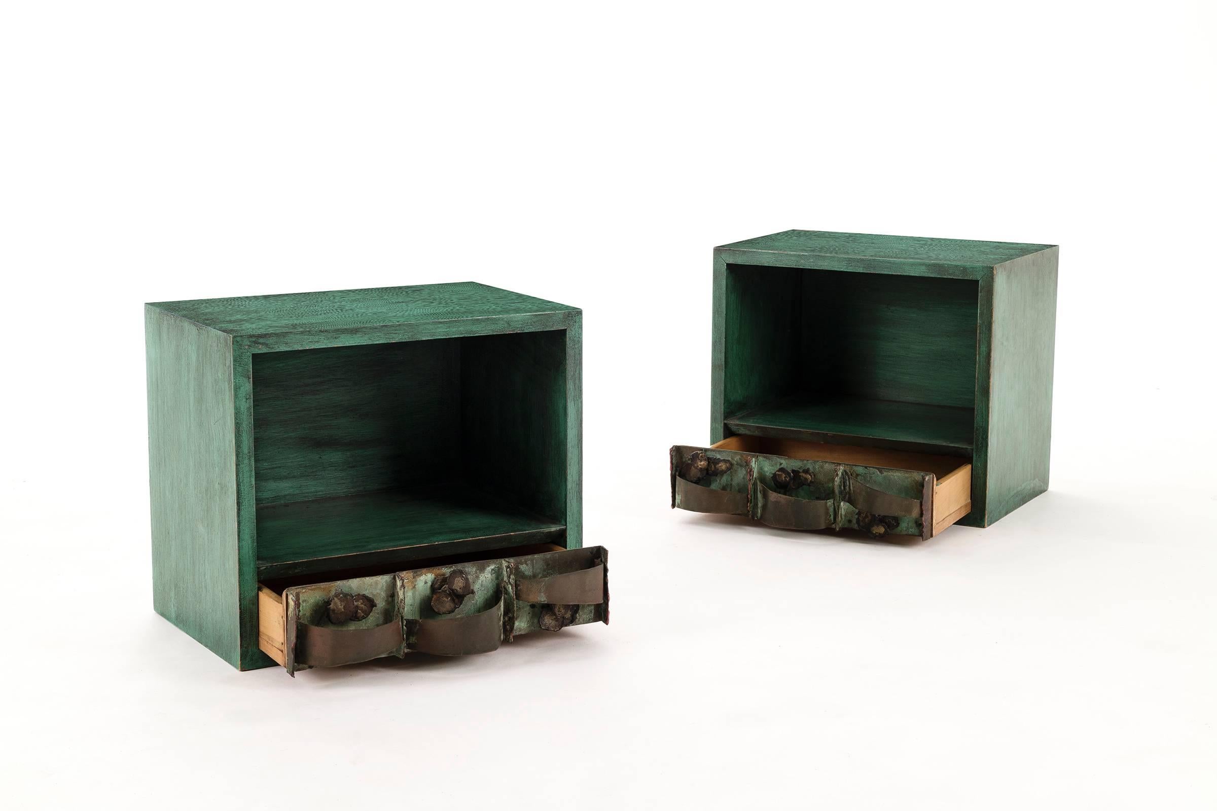 Paul Evans Studio, wall hung nightstands, verdigris sculpted
looped copper details, act as pulls. Antiqued exterior and interior finishes.
 
This item is currently on view in our NYC Greenwich Street Location.
