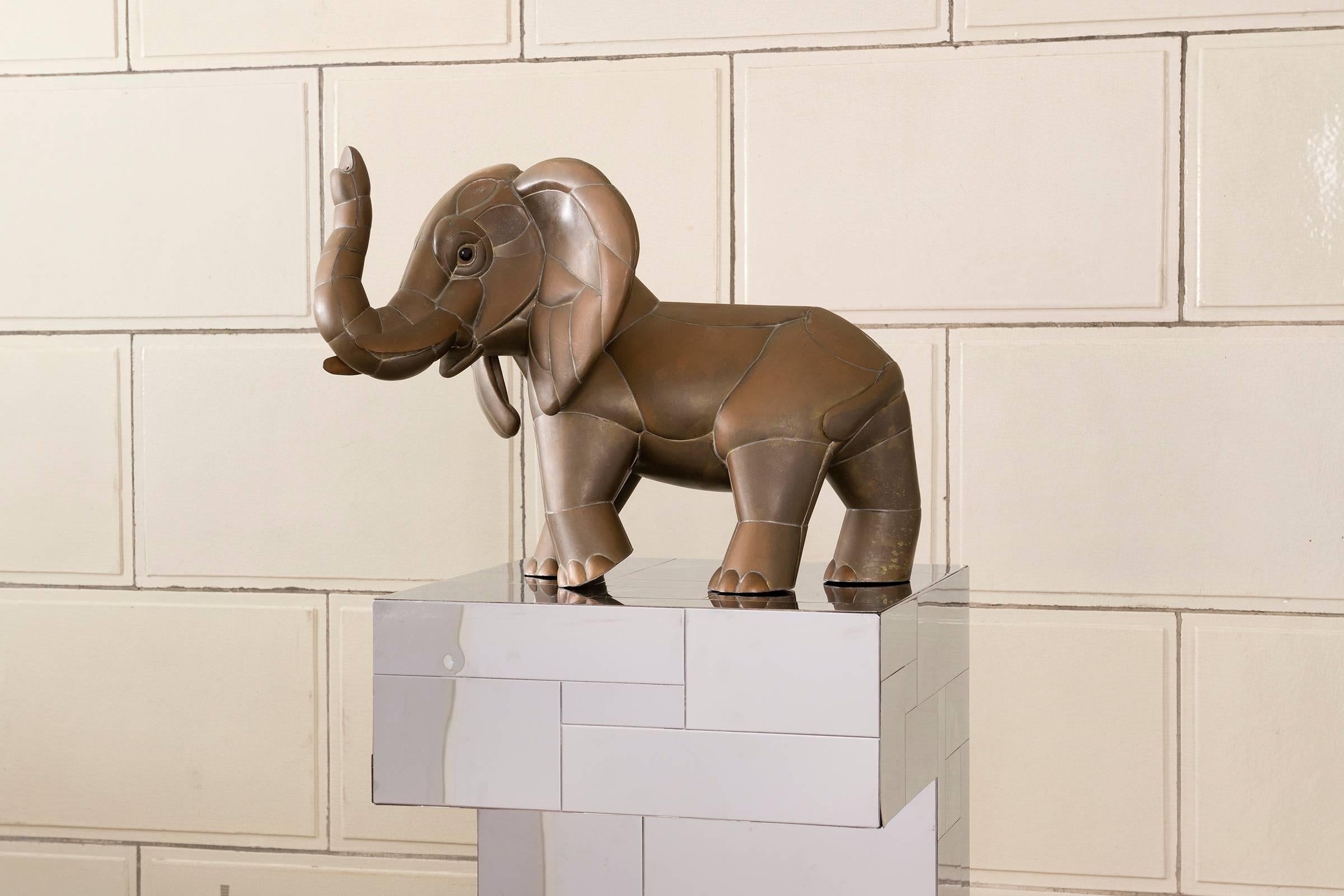 Soldered copper elephant sculpture.
