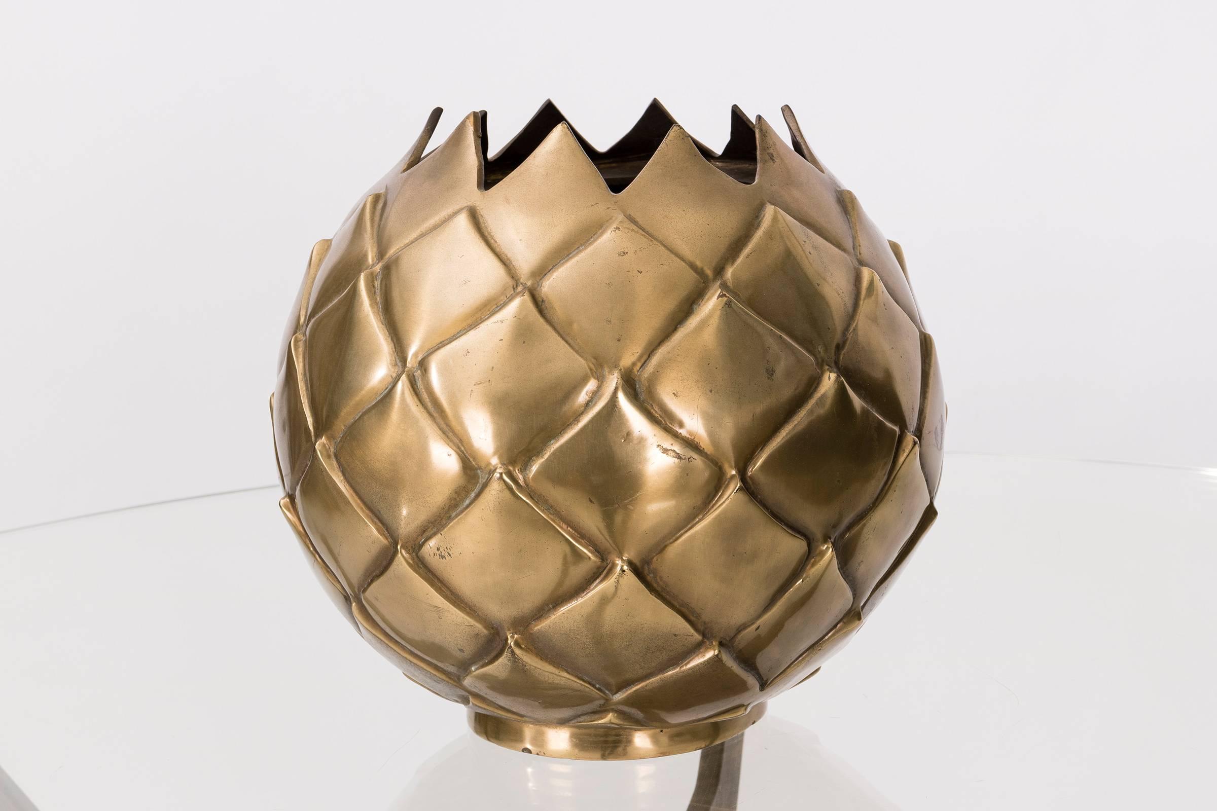 Large-scale vase is made with solid brass.