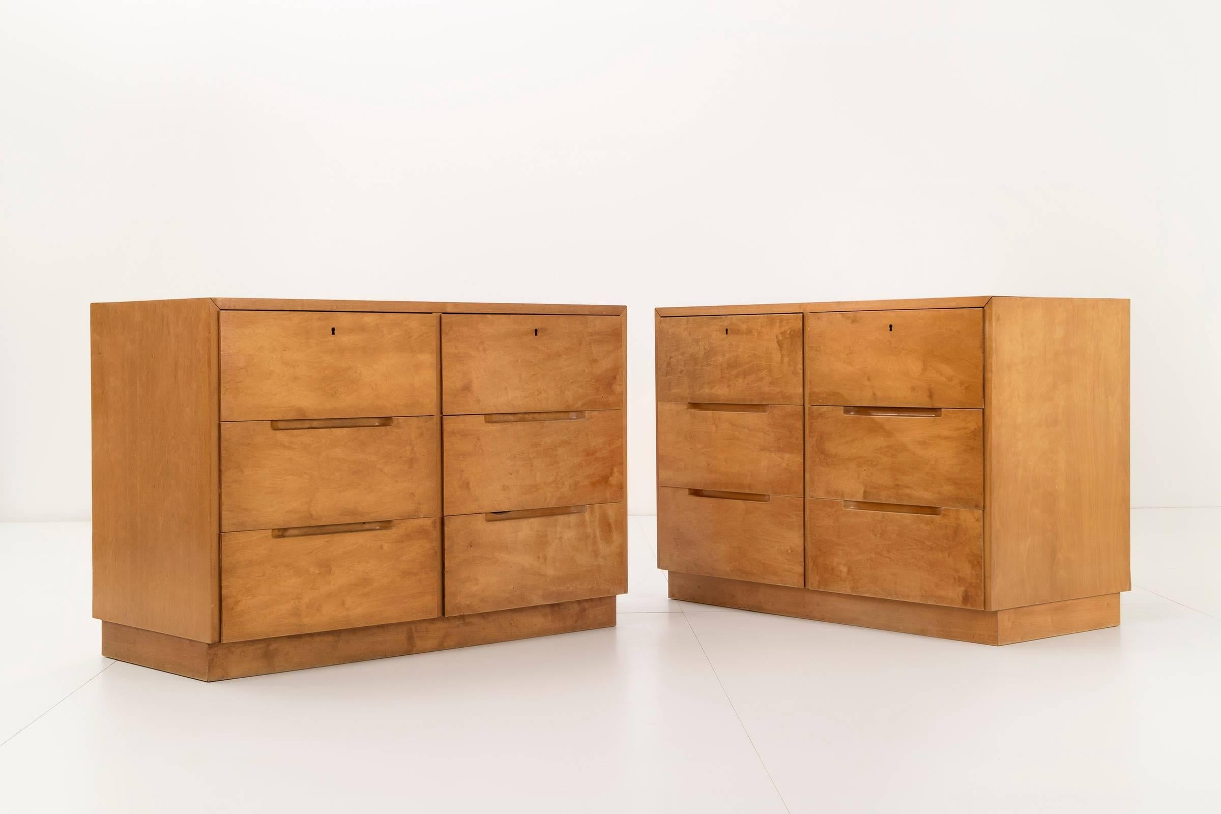 Early pair of Aalto cabinets for Finsven. This set of cabinets features six drawers and is constructed from birth plywood.