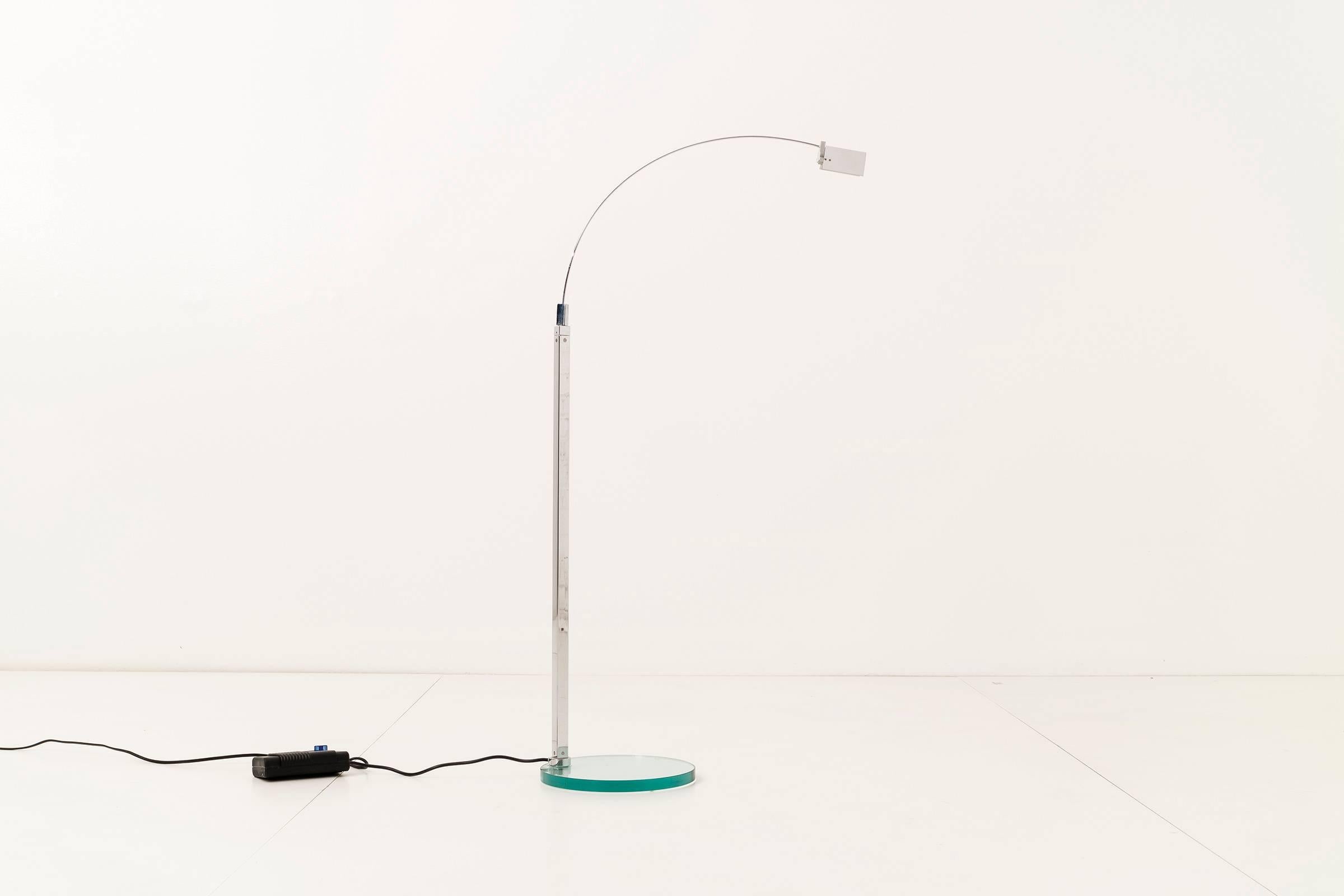 Alvaro Siza for Fontana Arte.
The Falena floor lamp features a aluminum swing arm mounded on a glass base.