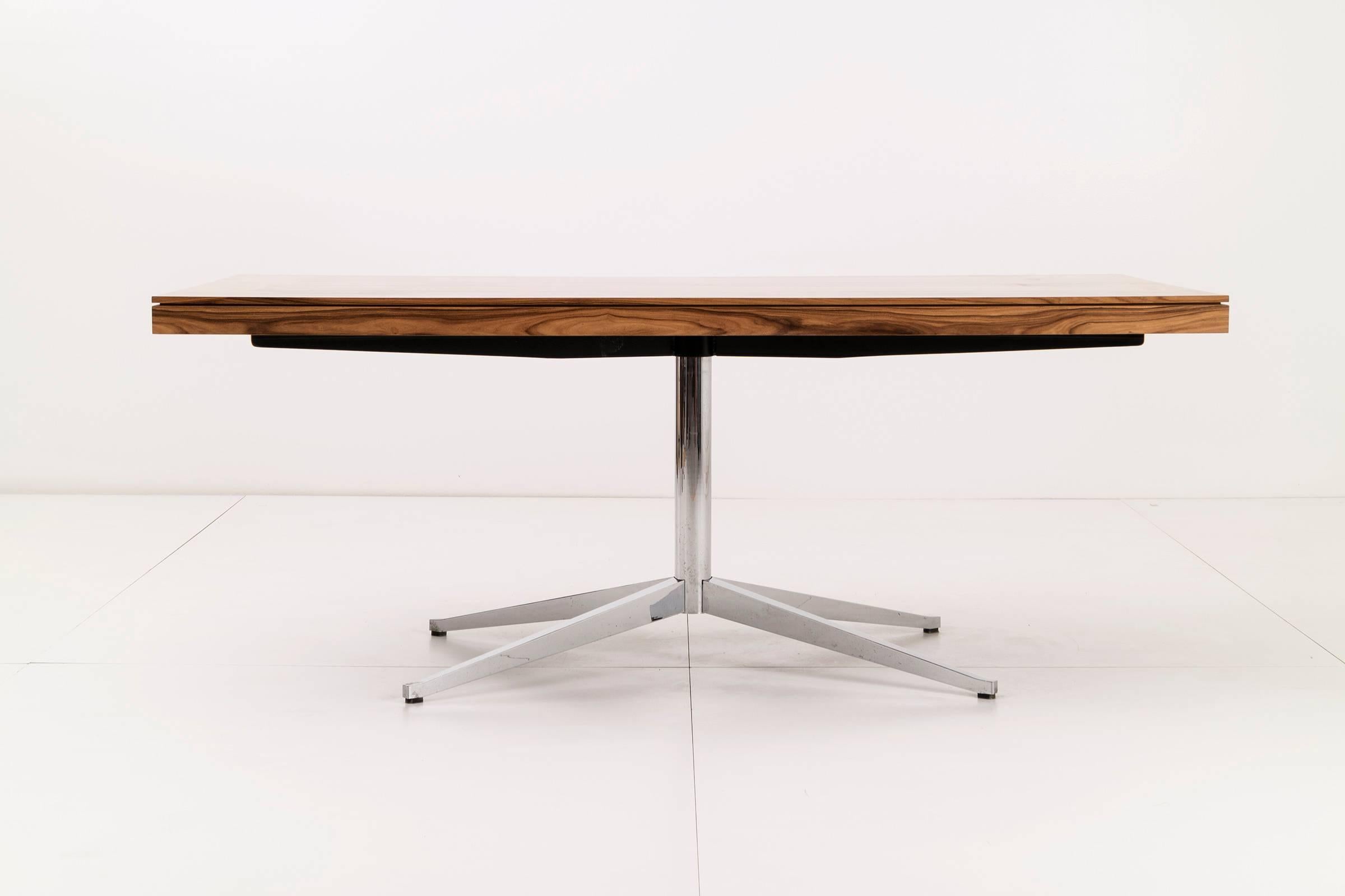 Florence knoll highly figured rosewood veneer desk with two pull-out drawers. Chrome-plated base.