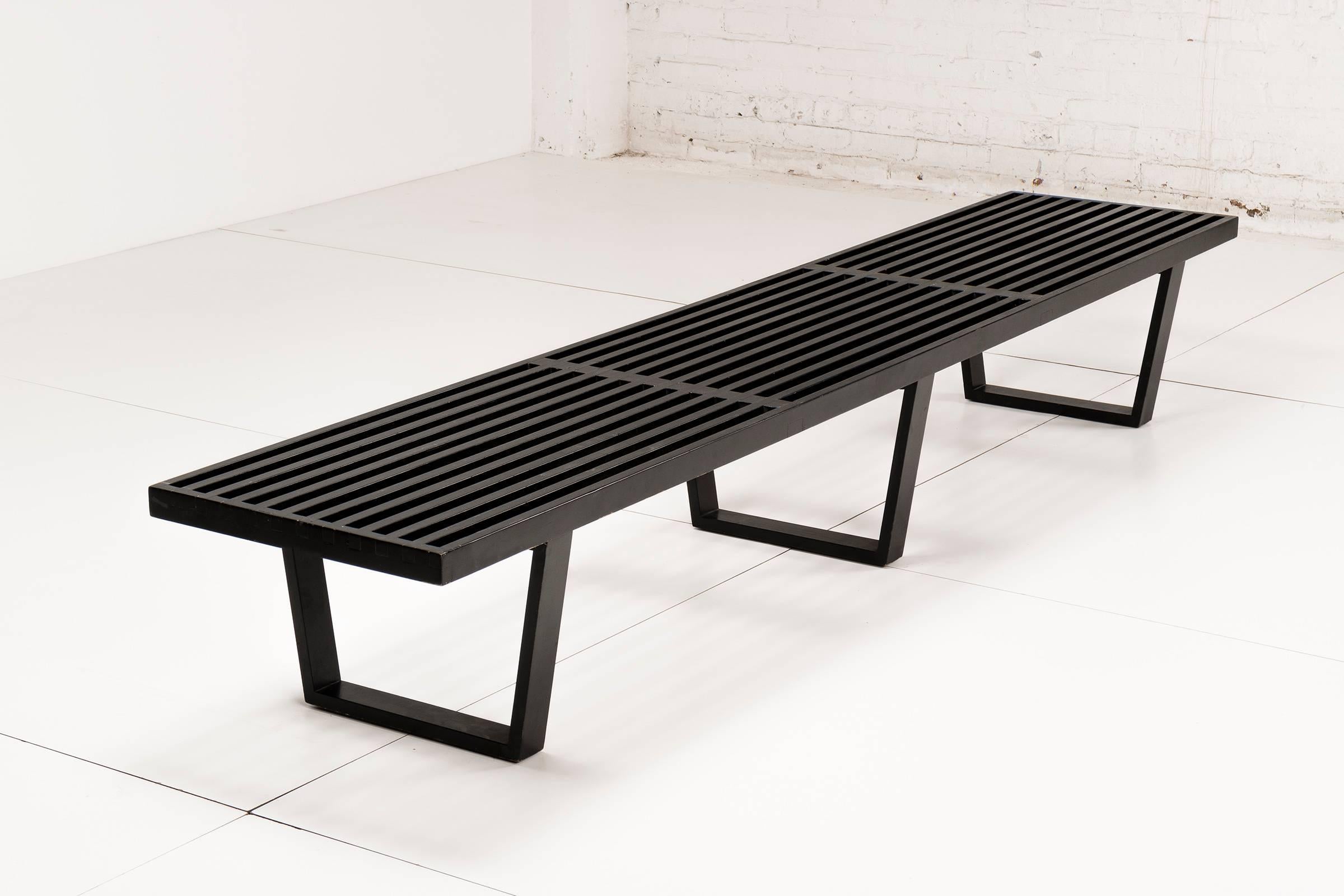 Iconic George Nelson design for Herman Miller. Model 4992. This slat bench is constructed from Black Lacquered Maple with a sled base. This bench can be used both as seating and as a coffee of sofa table. Cabinet sold separately.