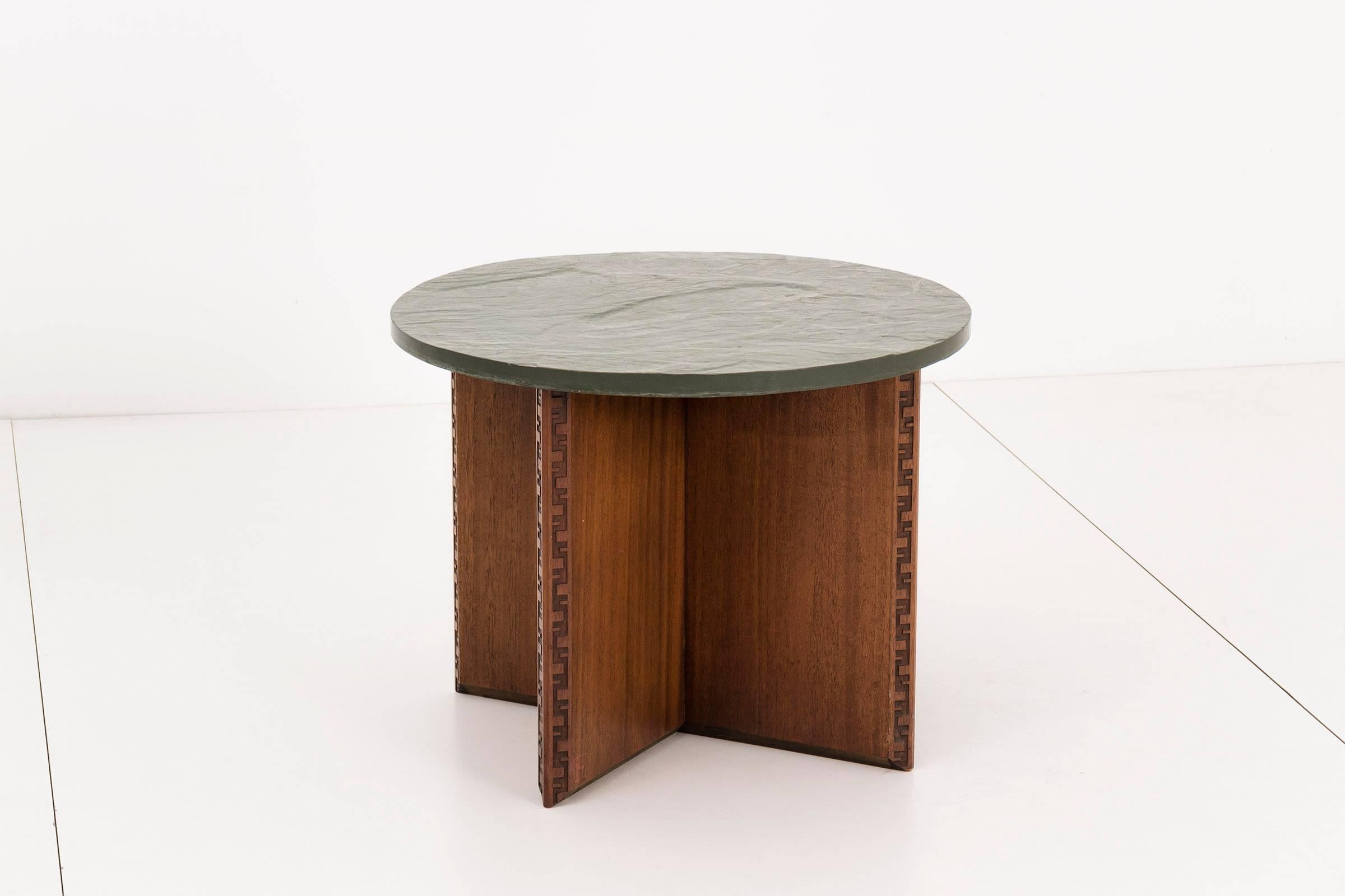 Frank Lloyd Wright for Heritage Henredon collection. Green slate top on a mahogany base. With signature Taliesin carving details. Factory stamped on base [Heritage Henredon by Frank Lloyd Wright]
(Chairs pictured sold separately as a set of four).