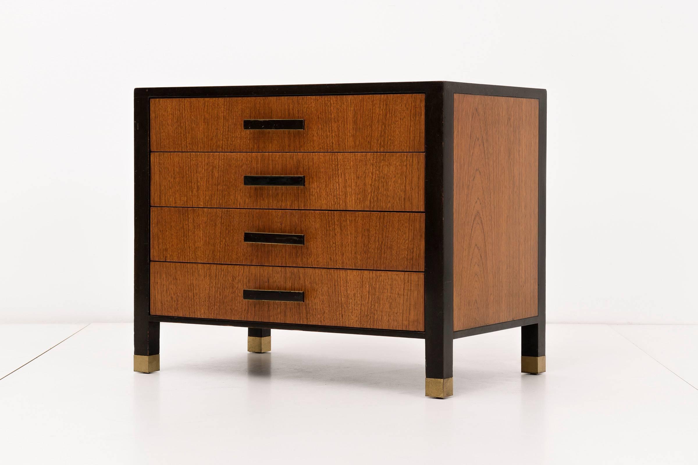 Pair of Harvey Probber side tables. Two-toned tone rosewood and walnut lacquered wood finish with brass feet and pulls details.
[Signed label Harvey Probber Modern].