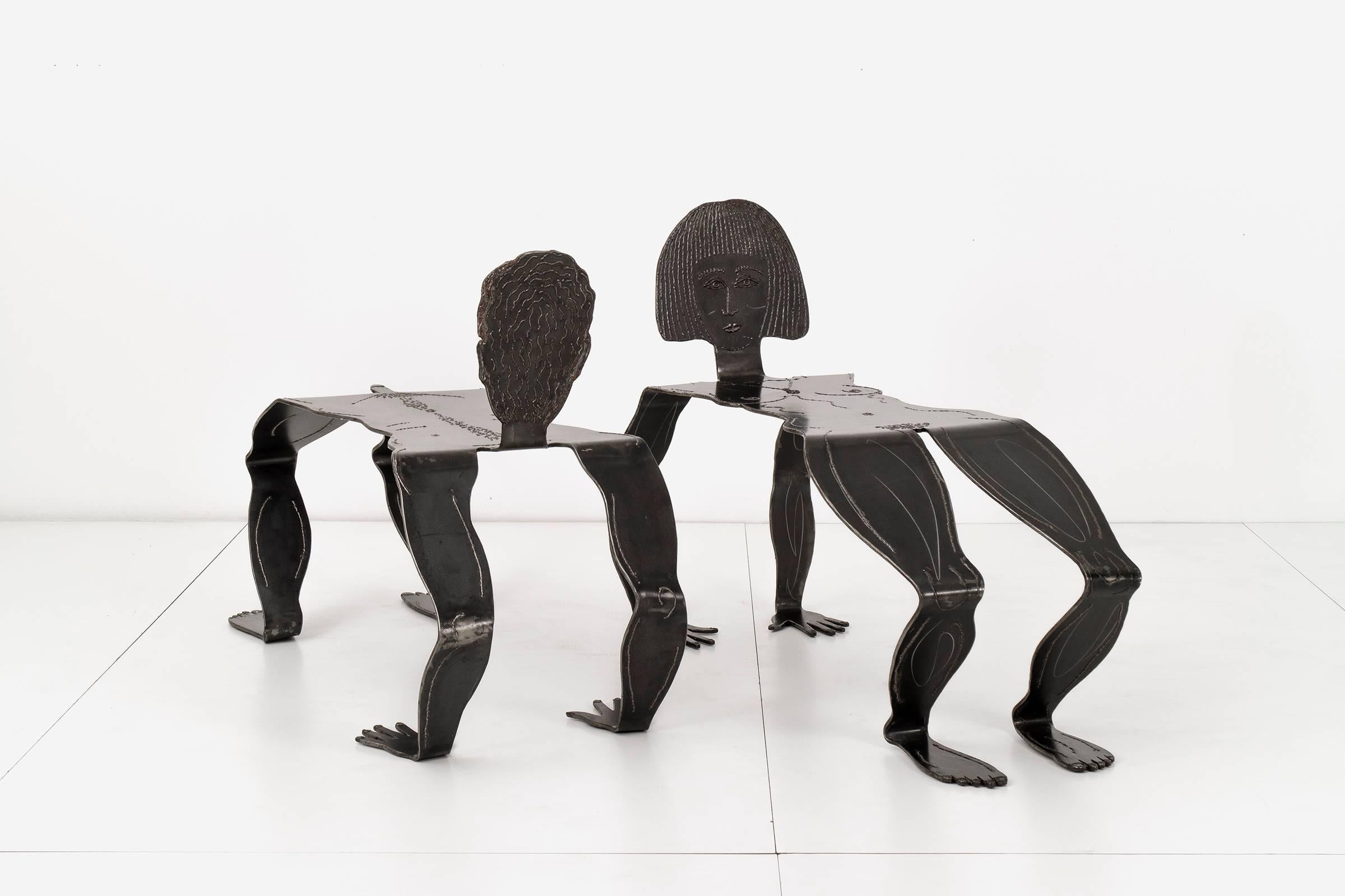 Two metal figures as benches designed by RLM. Signed & RLM '95 Ralph P-727; on the underside of the male and & RLM '95 P-707t; on the female. Sturdy and heavy. They are lacquer-coated for outdoor use. Both sculptures showing no weathering or