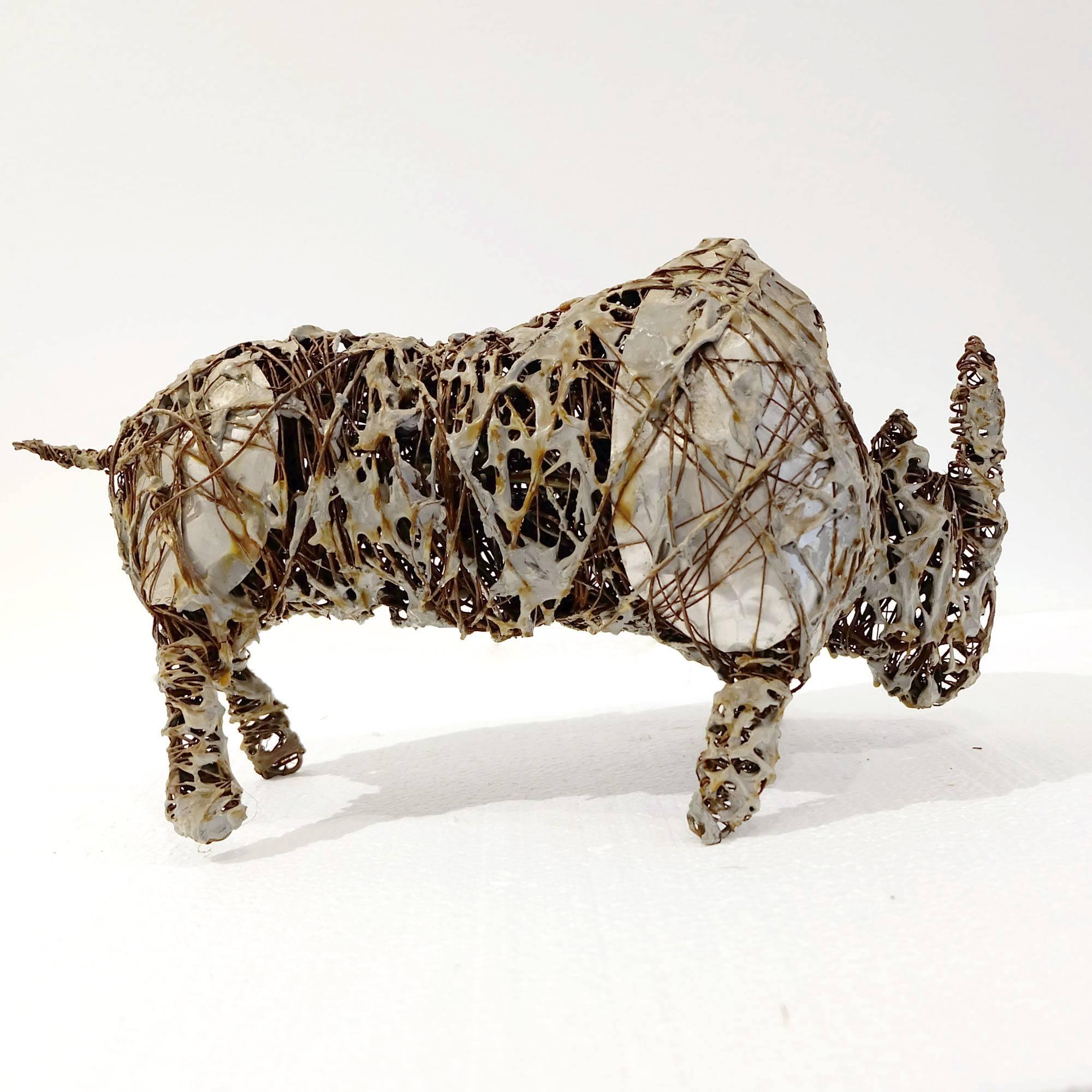 Hand wire with fused aluminum Rhino Figure