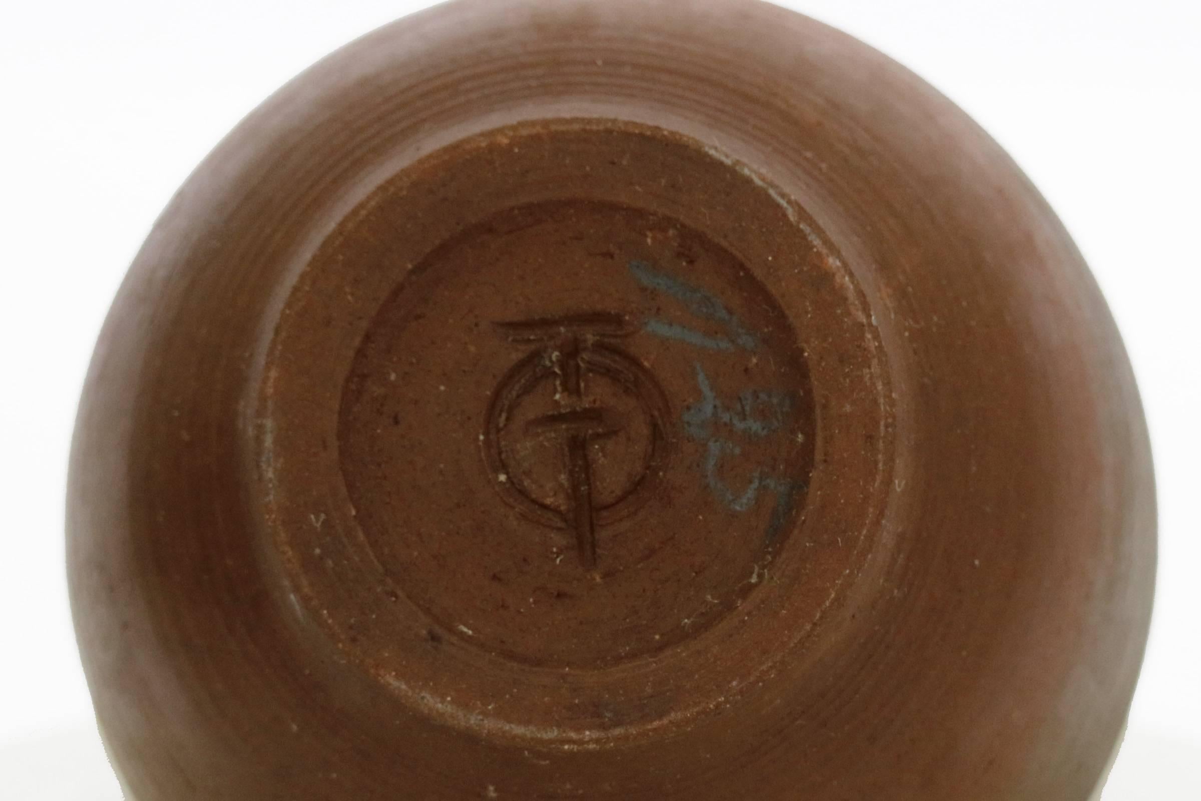 Painted ceramic vase with unknown marking on underside. 