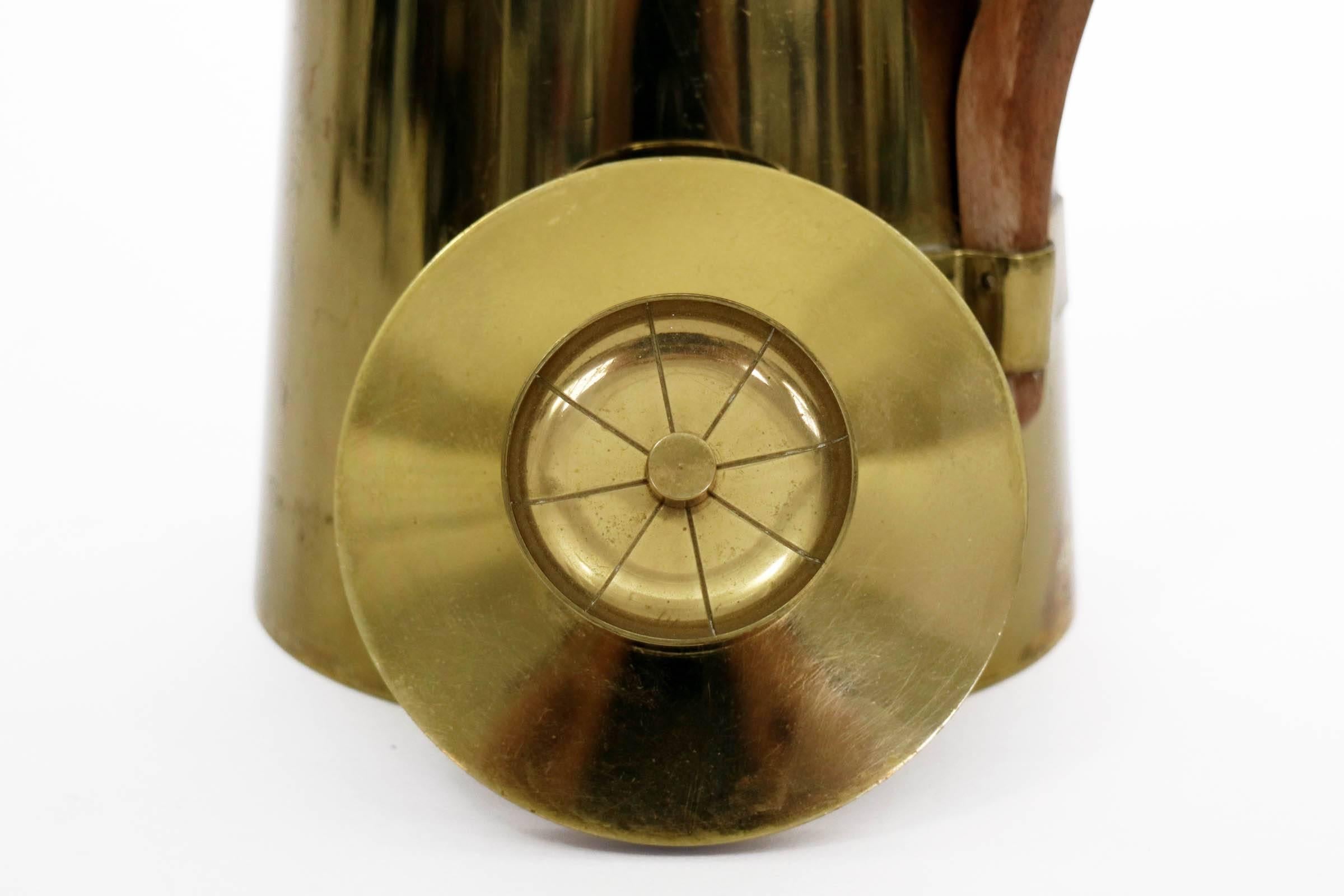 Brass Pitcher with lid and walnut handle.