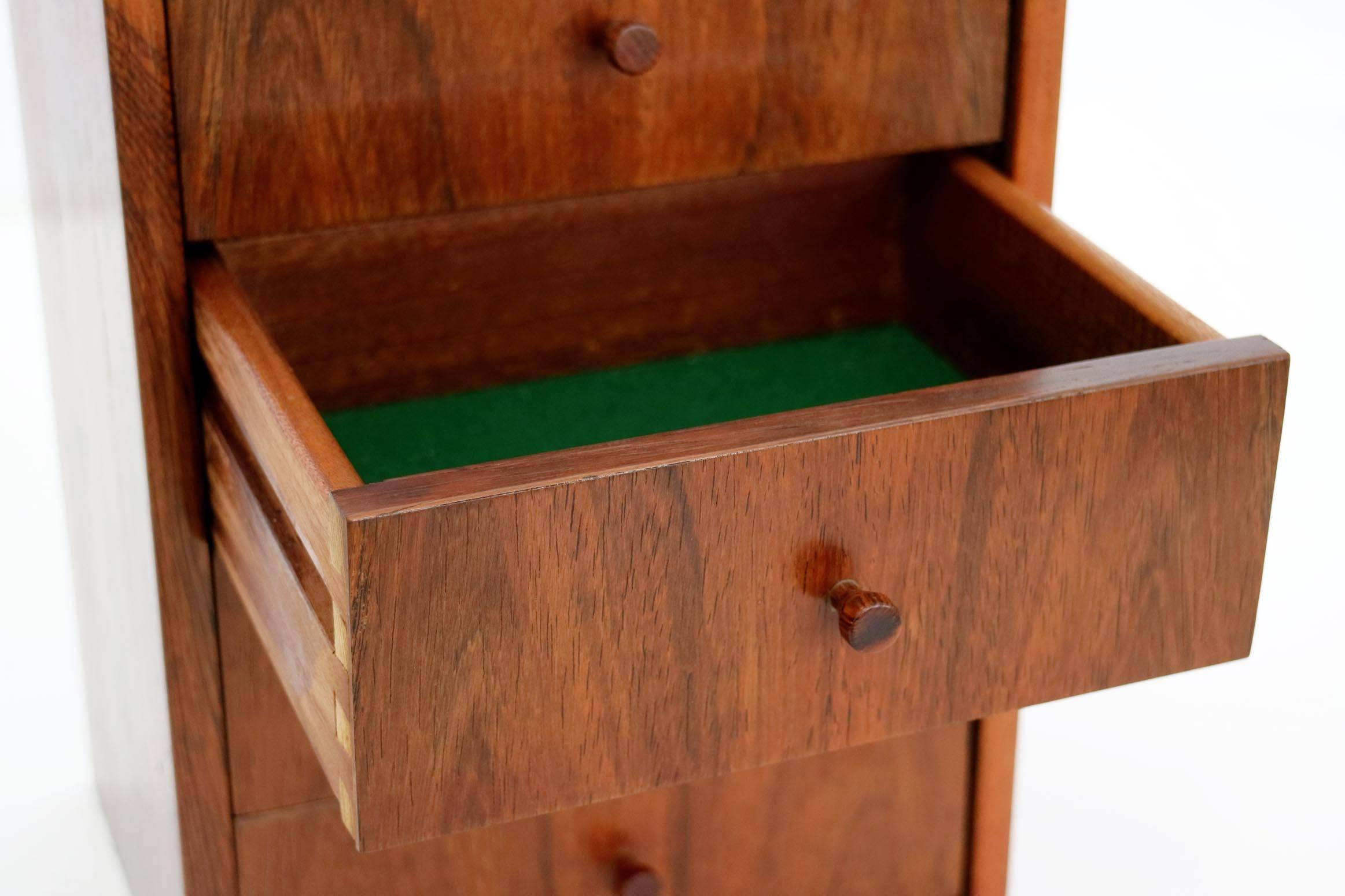 4 Green lined felt drawers and oiled teak wood.