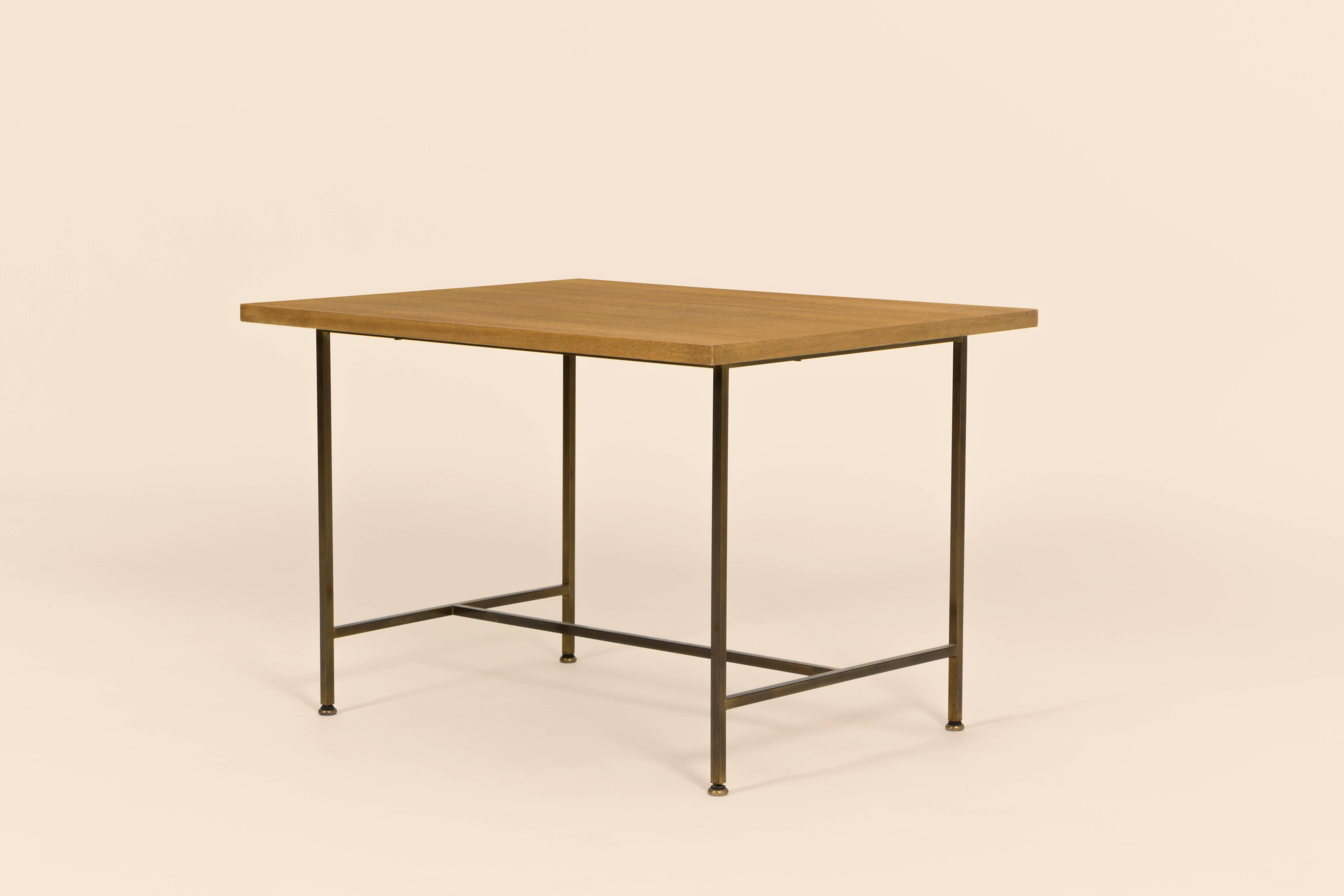 Paul McCobb side table. Mahogany surface, brass frame.
