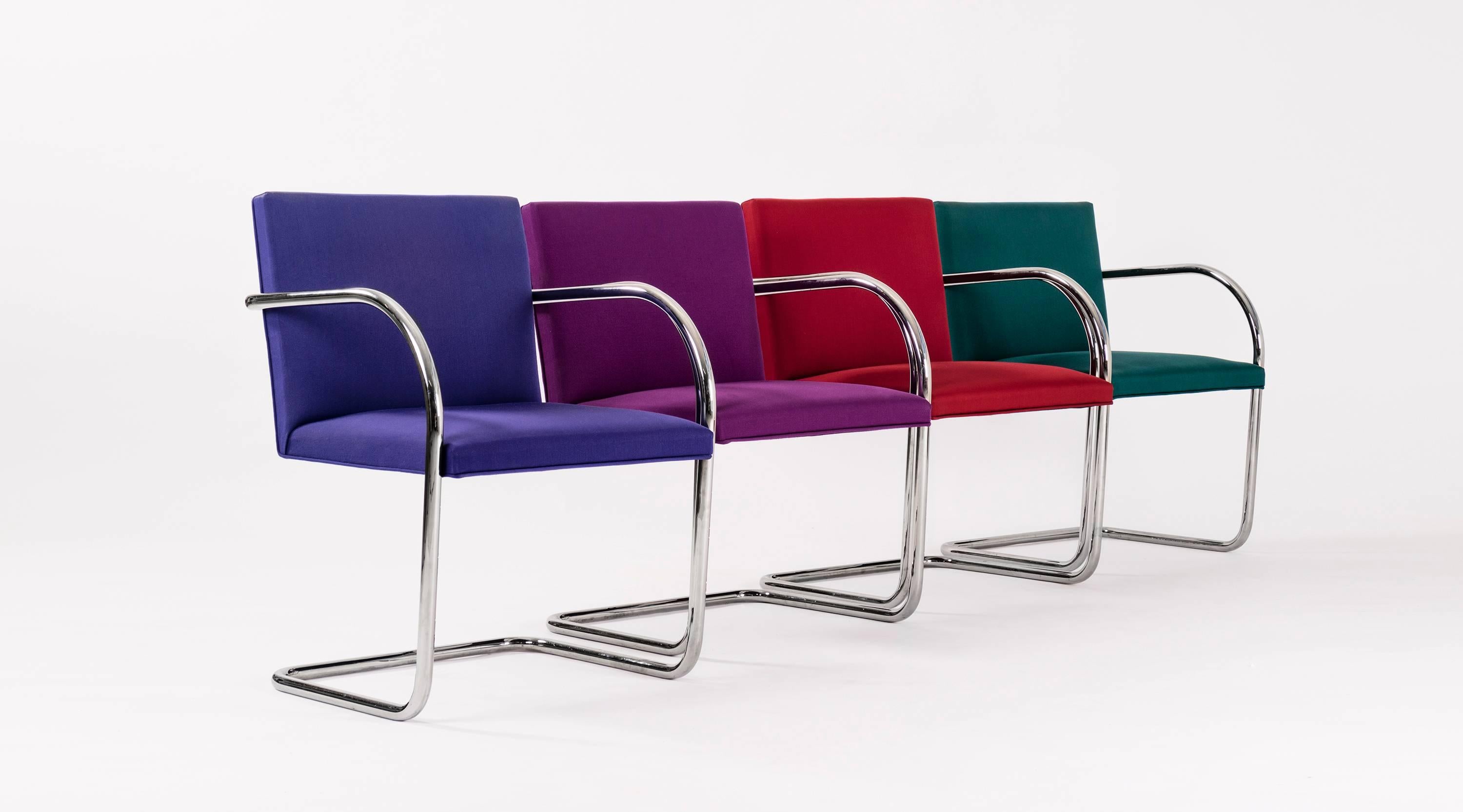Mies; four sets of three Brno tubular chairs in crimson red, Byzantium purple, indigo blue, and pine green wool. Designed by Mies van der Rohe in 1930 for the Tugendhat House. Chrome-plated steel frame.
Signed label Knoll International.