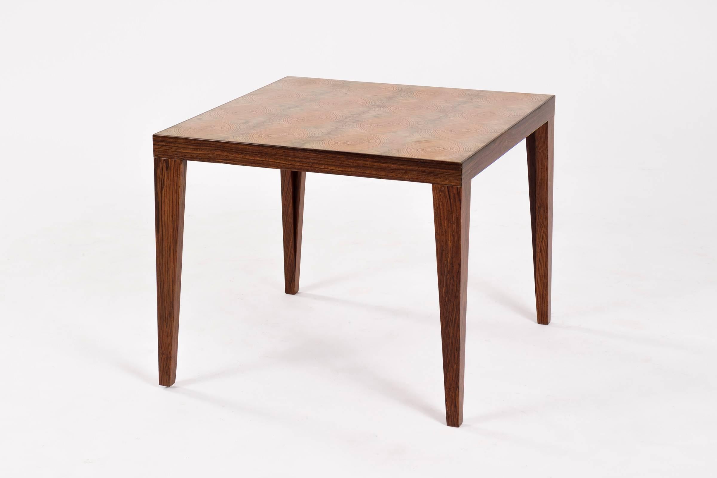 Unique side table- rosewood legs, bookmatched  end grain veneer Douglas fir top by Uruguayan Craftsman Roberto Sorrondeguy.
1997 Neocon award winning designer for his tables.

This item is currently on view in our NYC Greenwich Street location