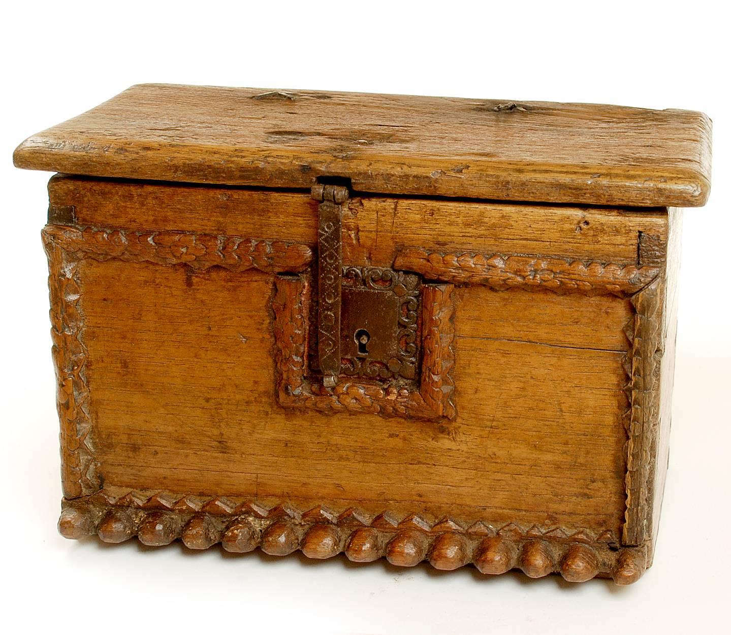 A good 18th century Spanish colonial 'scribe' box, or 'escribania' as it is known in Spanish -- for the storage of papers, ink and writing instruments. Red cedar with hand carved cedar wood moldings, iron lock-plate and a small, quasi secret
