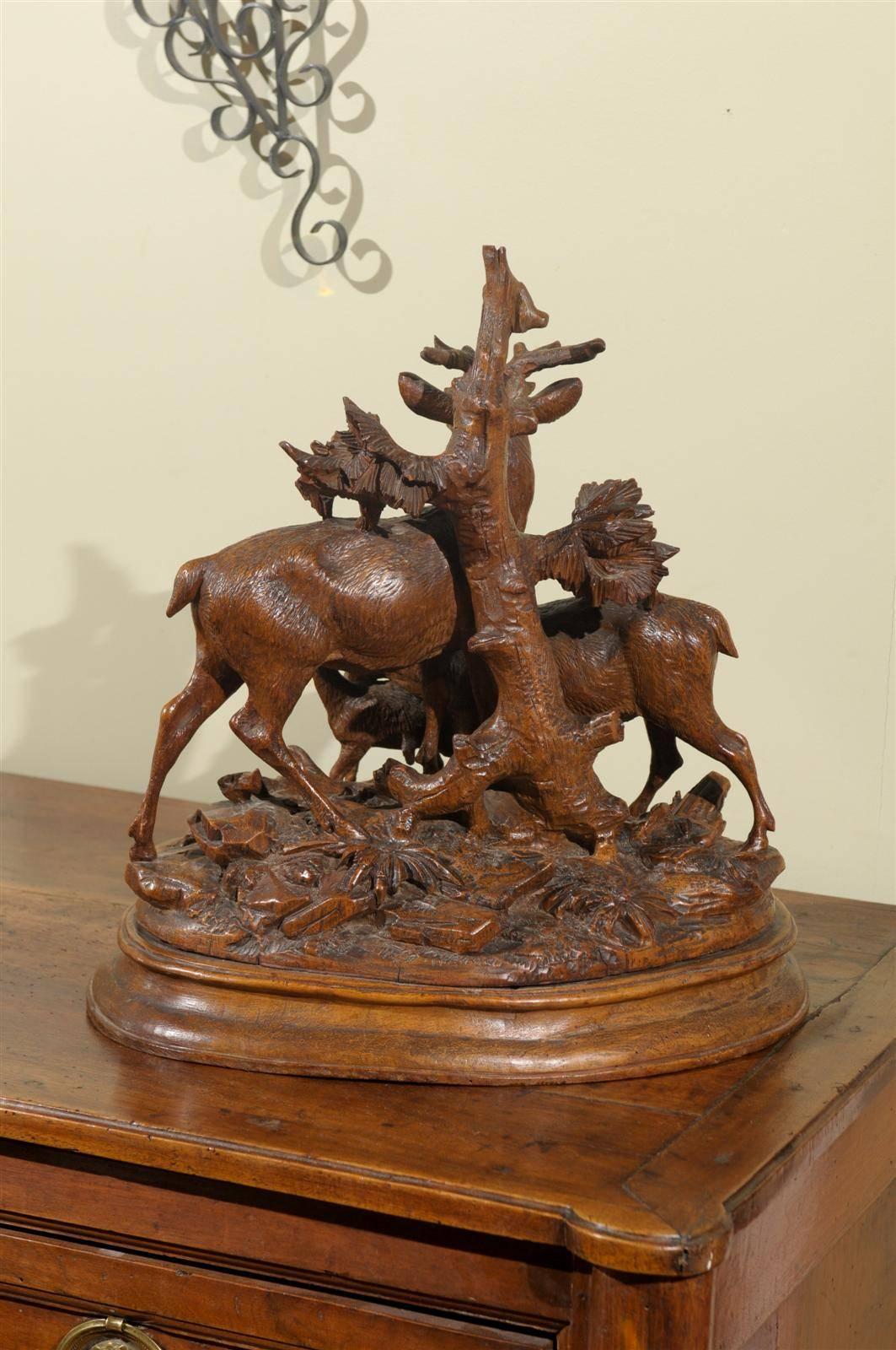 19th century Black Forest stag grouping raised on a stepped circular base.