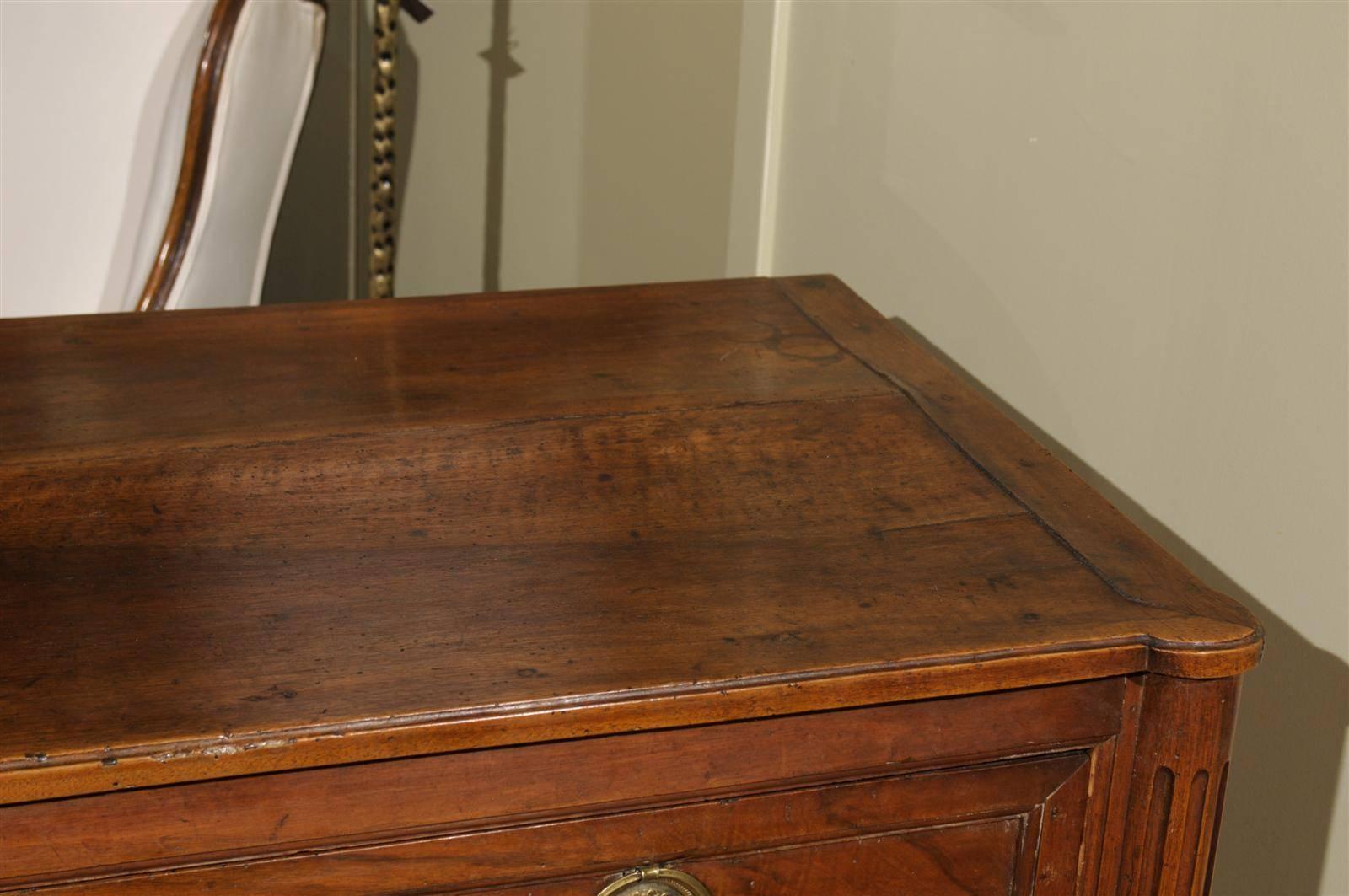 Carved French Louis XVI Style Walnut Two-Drawer Commode With Cartouche Motif For Sale