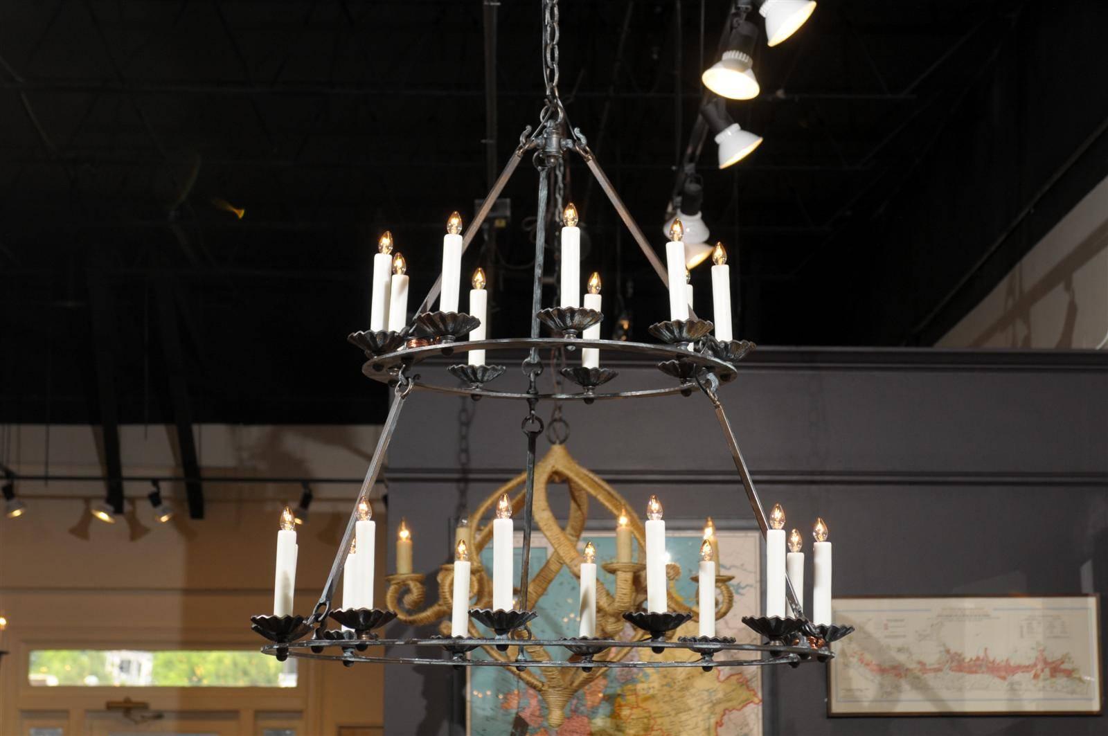 Custom double ring wrought iron chandelier with bronze finish. 21 lights can be custom-made in size and color.