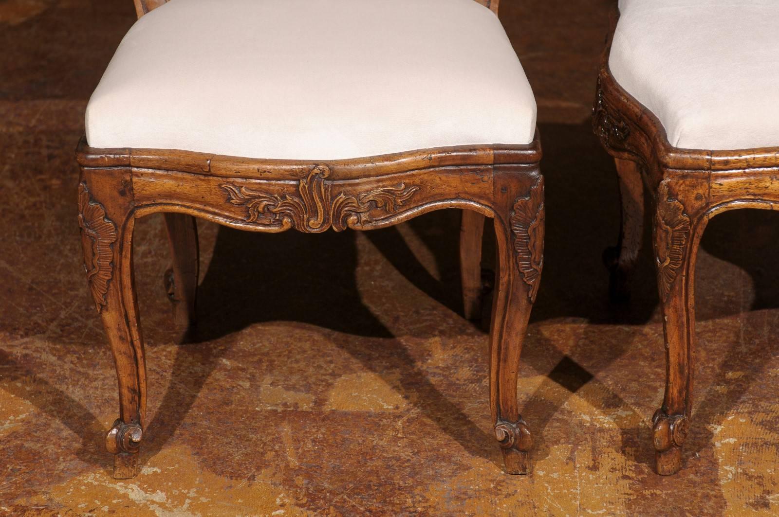 Upholstery Set of 12 Italian Louis XV Style Upholstered Chairs with Rocailles, circa 1880