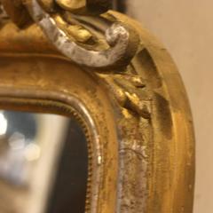 French Louis XVI Style Gilt and Silvered Mirror with Carved Crest, 19th Century