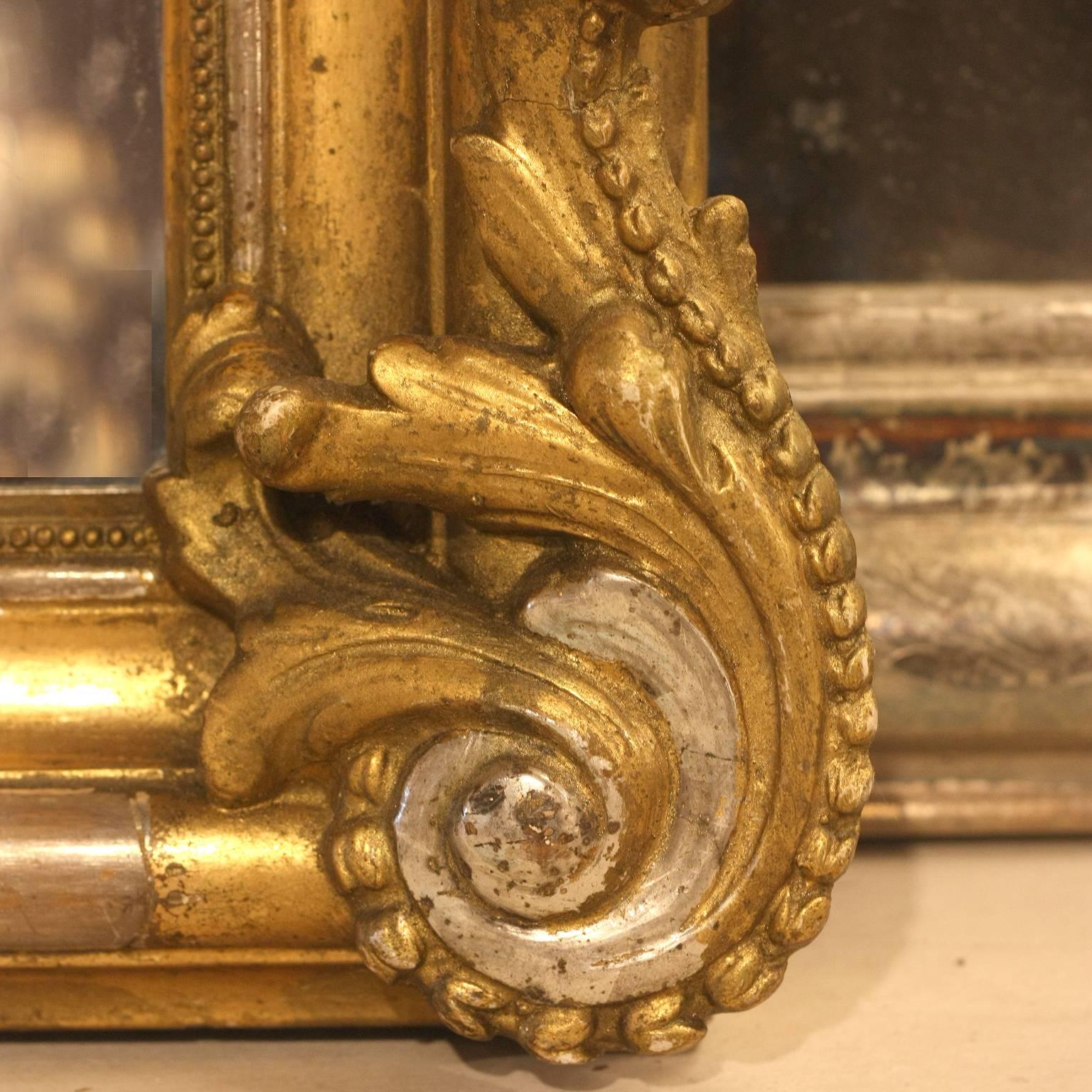 French Louis XVI Style Gilt and Silvered Mirror with Carved Crest, 19th Century 1