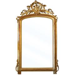 French Louis XV Style 19th Century Giltwood Mirror with Carved Crest and Beading