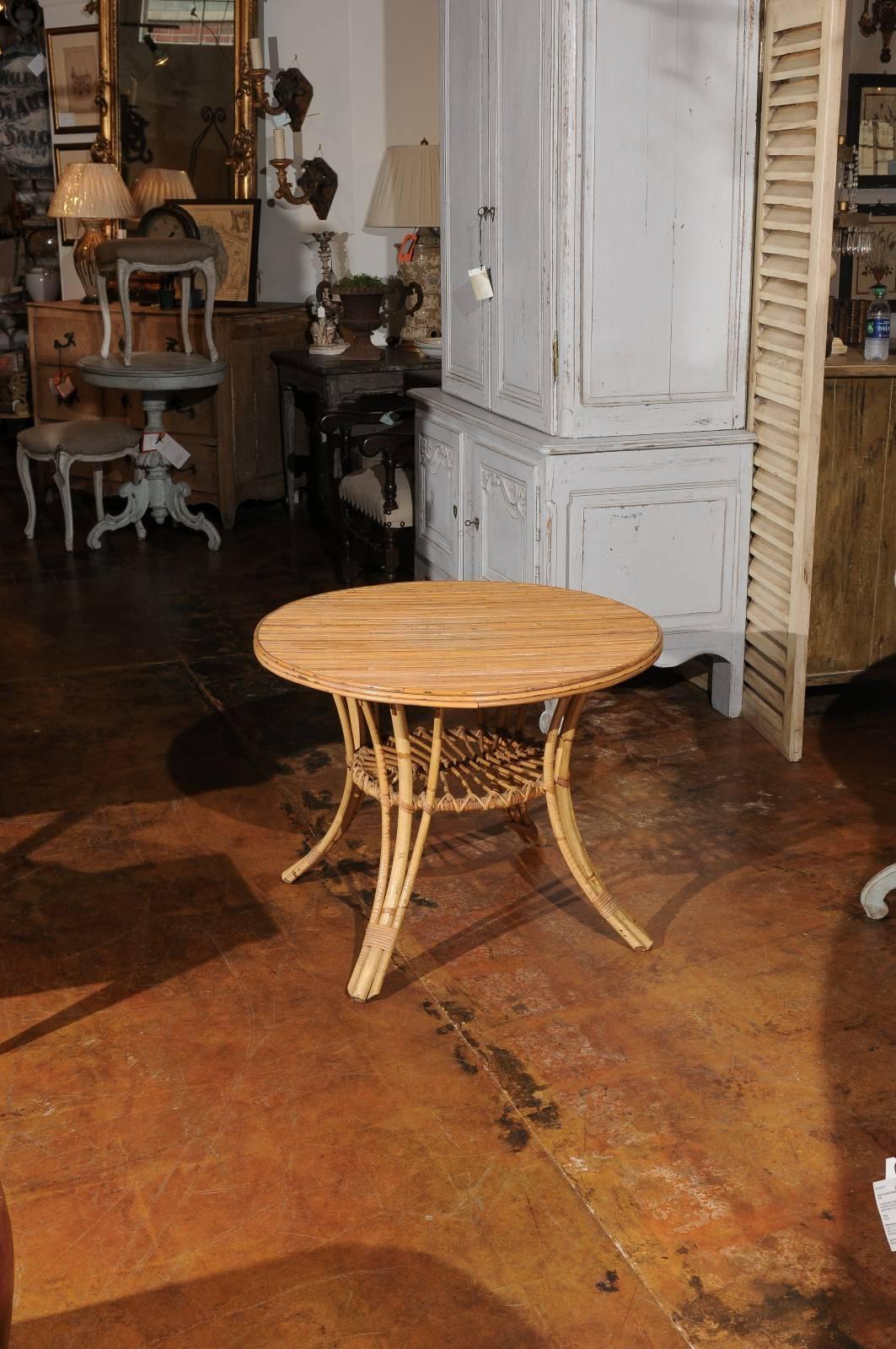 Mid-Century Modern French Mid-Century Rattan Round Side Table with Lower Shelf and Splayed Legs