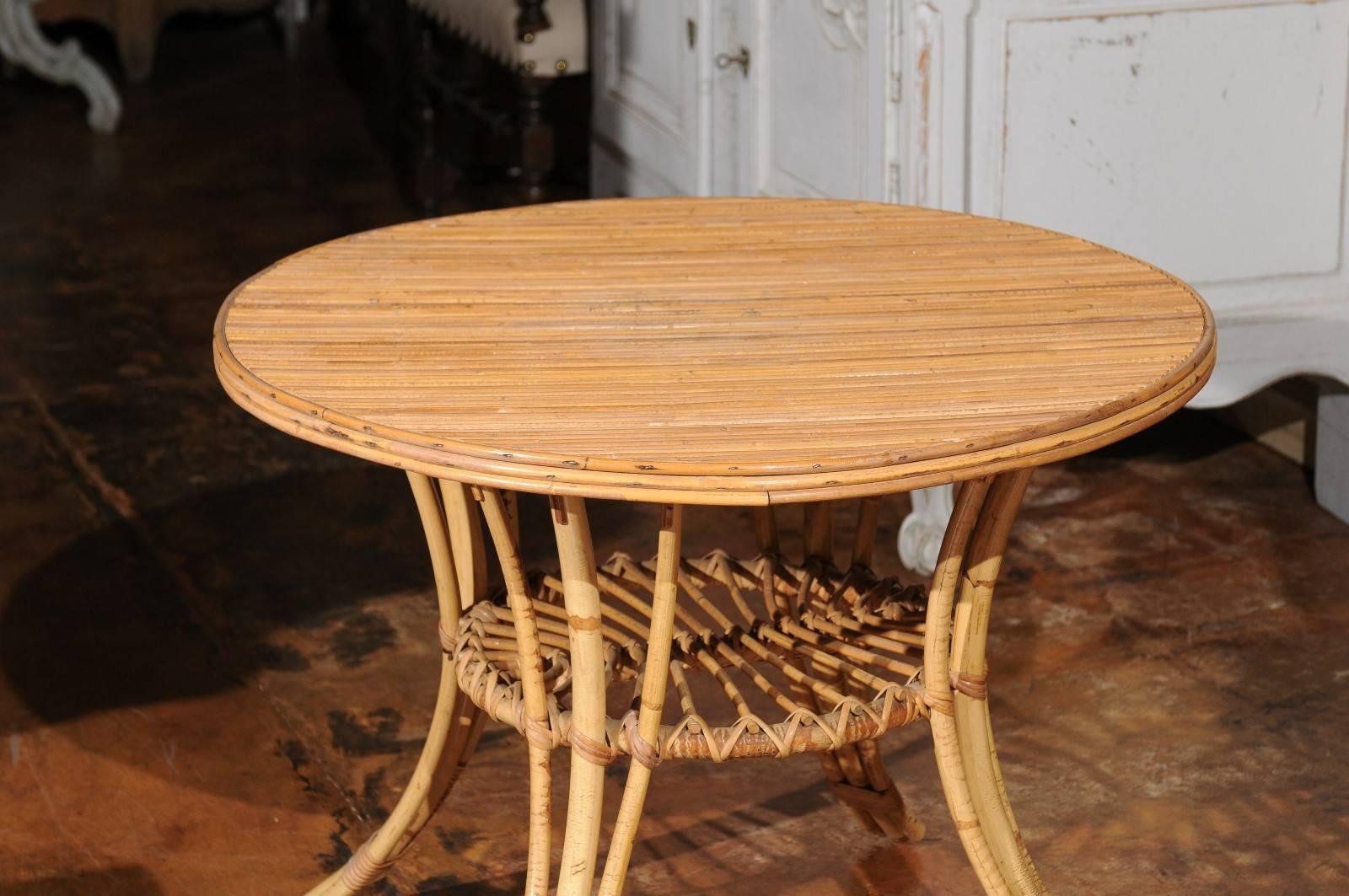 French Mid-Century Rattan Round Side Table with Lower Shelf and Splayed Legs In Good Condition In Atlanta, GA