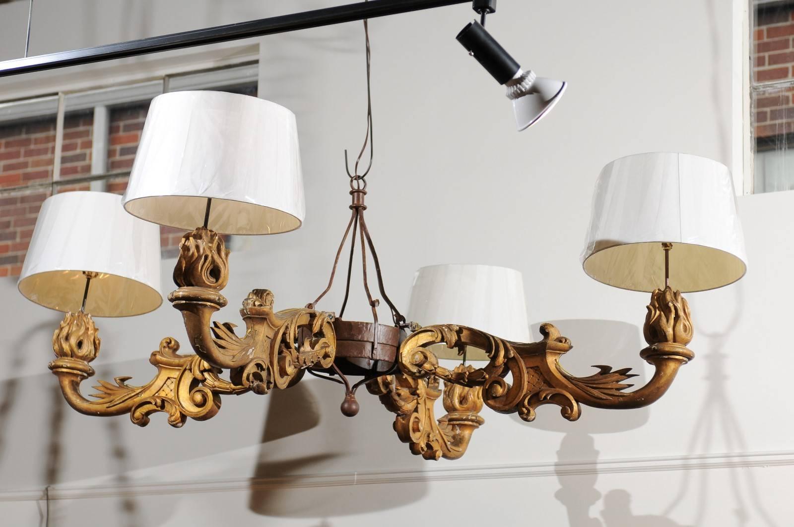Chandelier made from giltwood architectural elements. Shades not included.